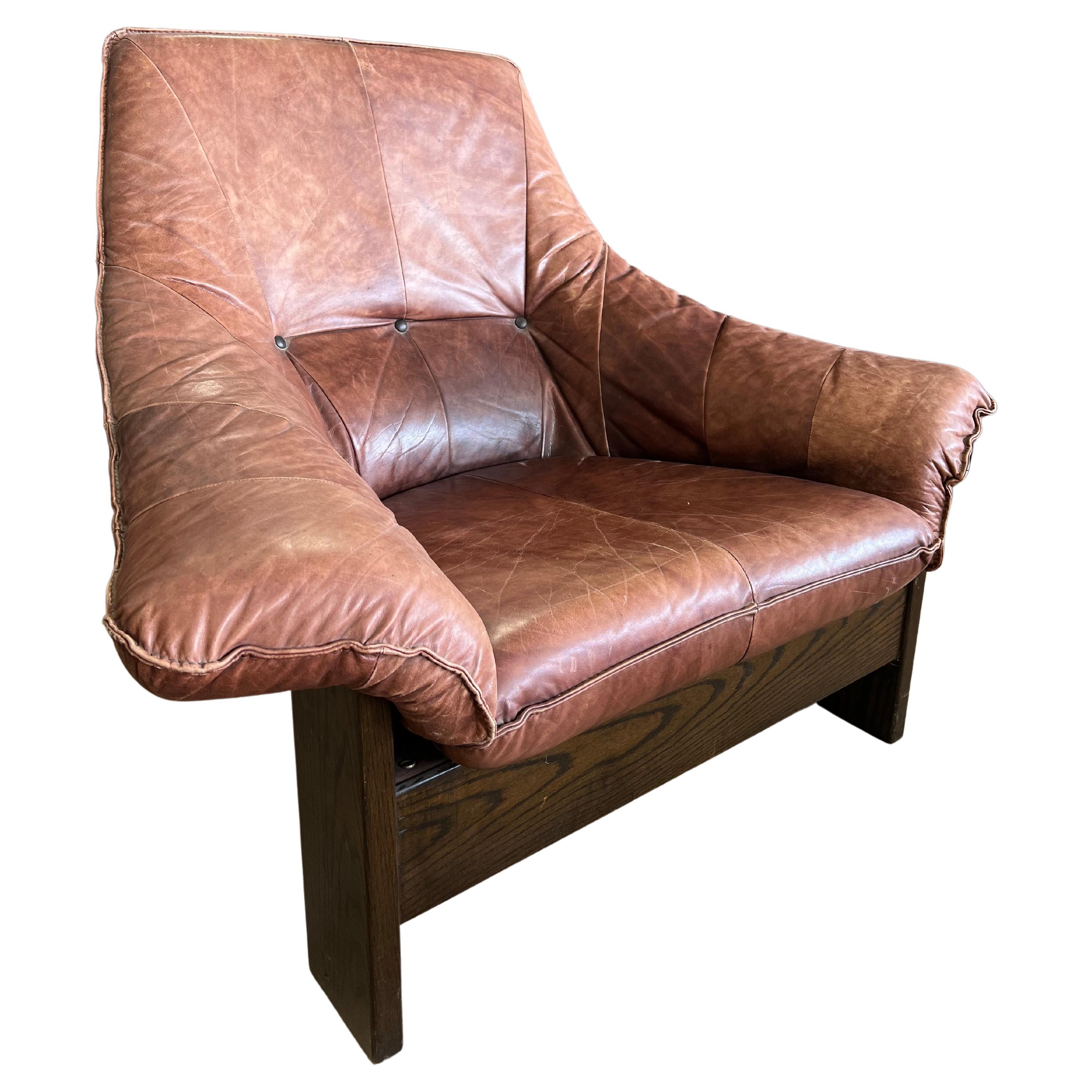 1970’s Swedish Leather And Wood Lounge Chair For Sale