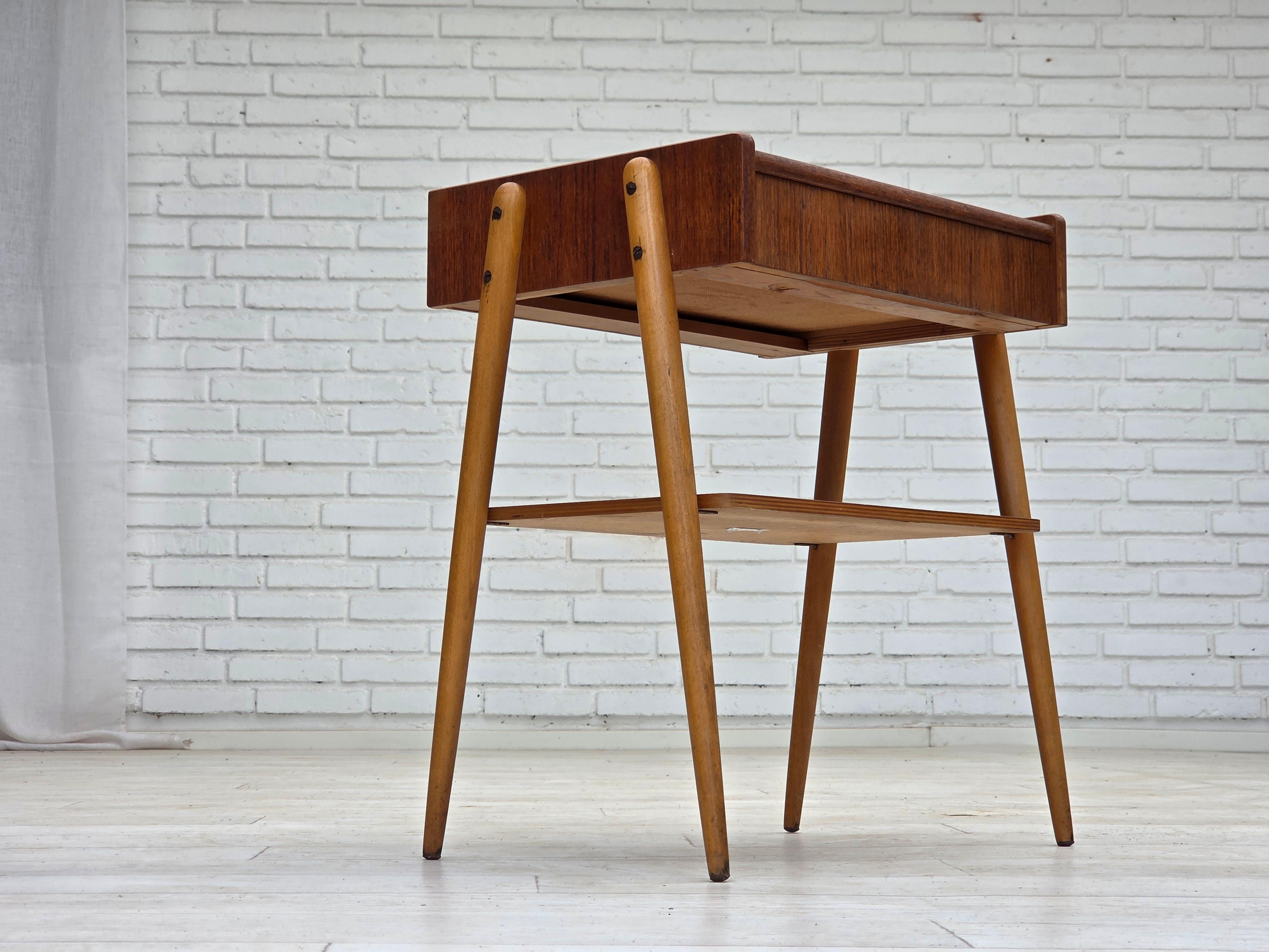 1970s, Swedish side table with drawer. Teak wood, beech wood legs. Original very good condition: no smells, no stains and stable construction. Manufactured by Swedish furniture maker AB Carlstrom in about 1970-75s. Original Scandinavian vintage