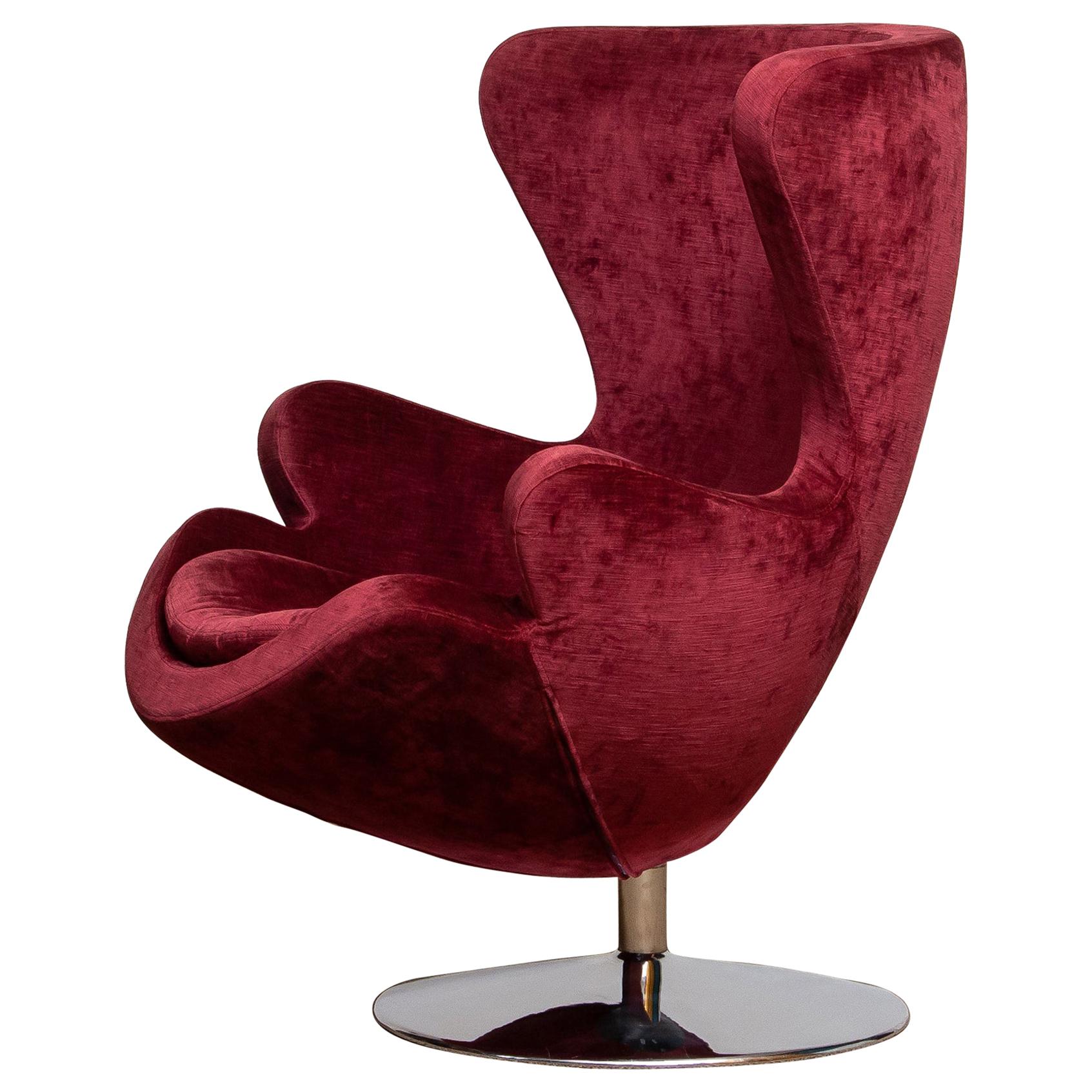 Mid-Century Modern 1970s Swivel Lounge Egg Chair on Chrome Stand Colored in Bordeaux Red Baby Roy