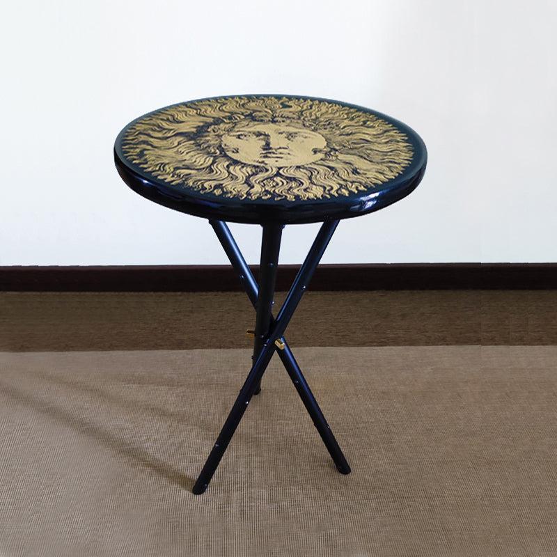 1970s Gorgeous round table by Piero Fornasetti depicting in gold color 