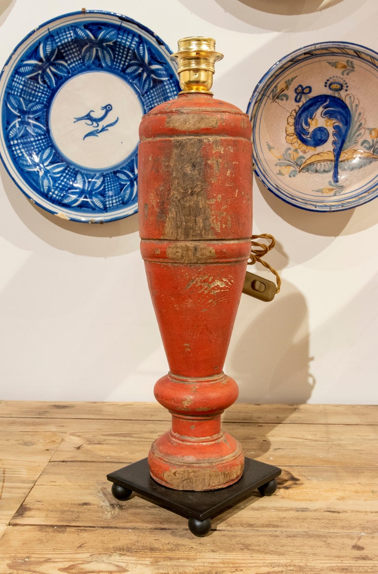 1970s, Table Lamp Made from a Red Painted Wooden Bed Leg For Sale at