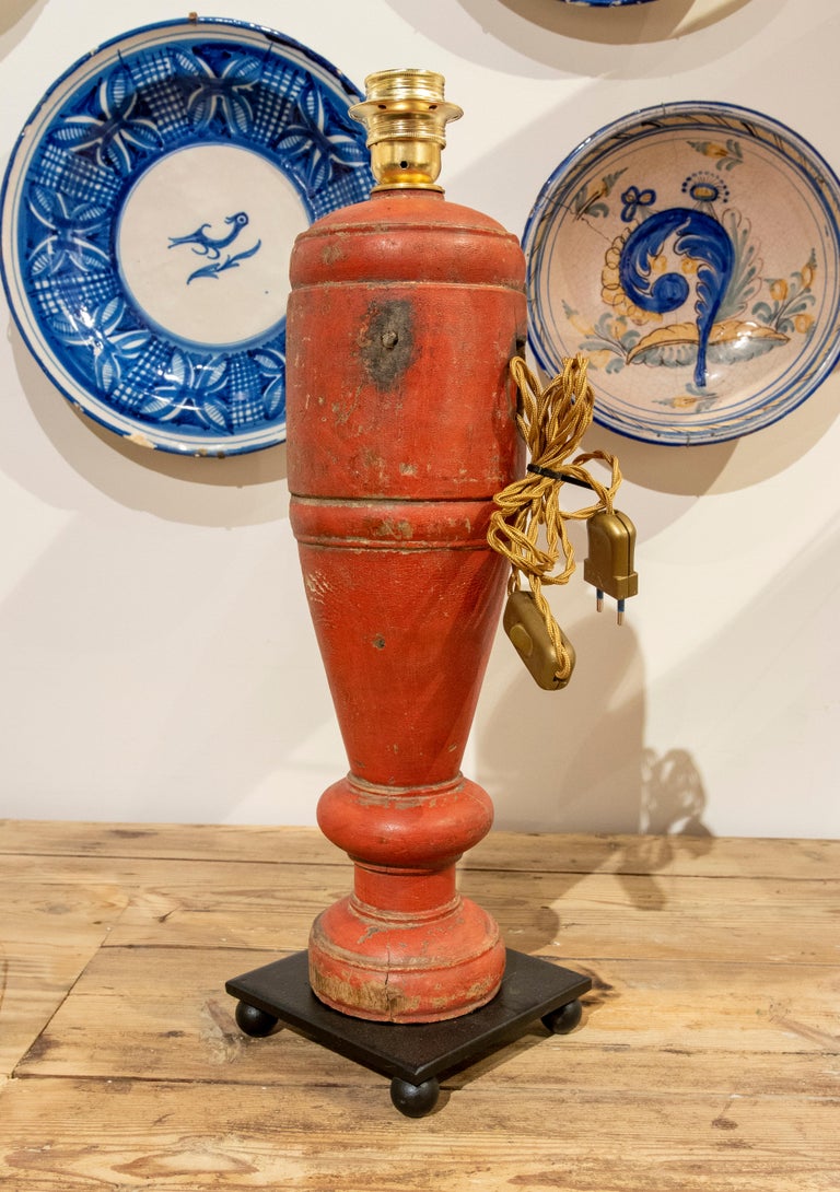 1970s, Table Lamp Made from a Red Painted Wooden Bed Leg For Sale at