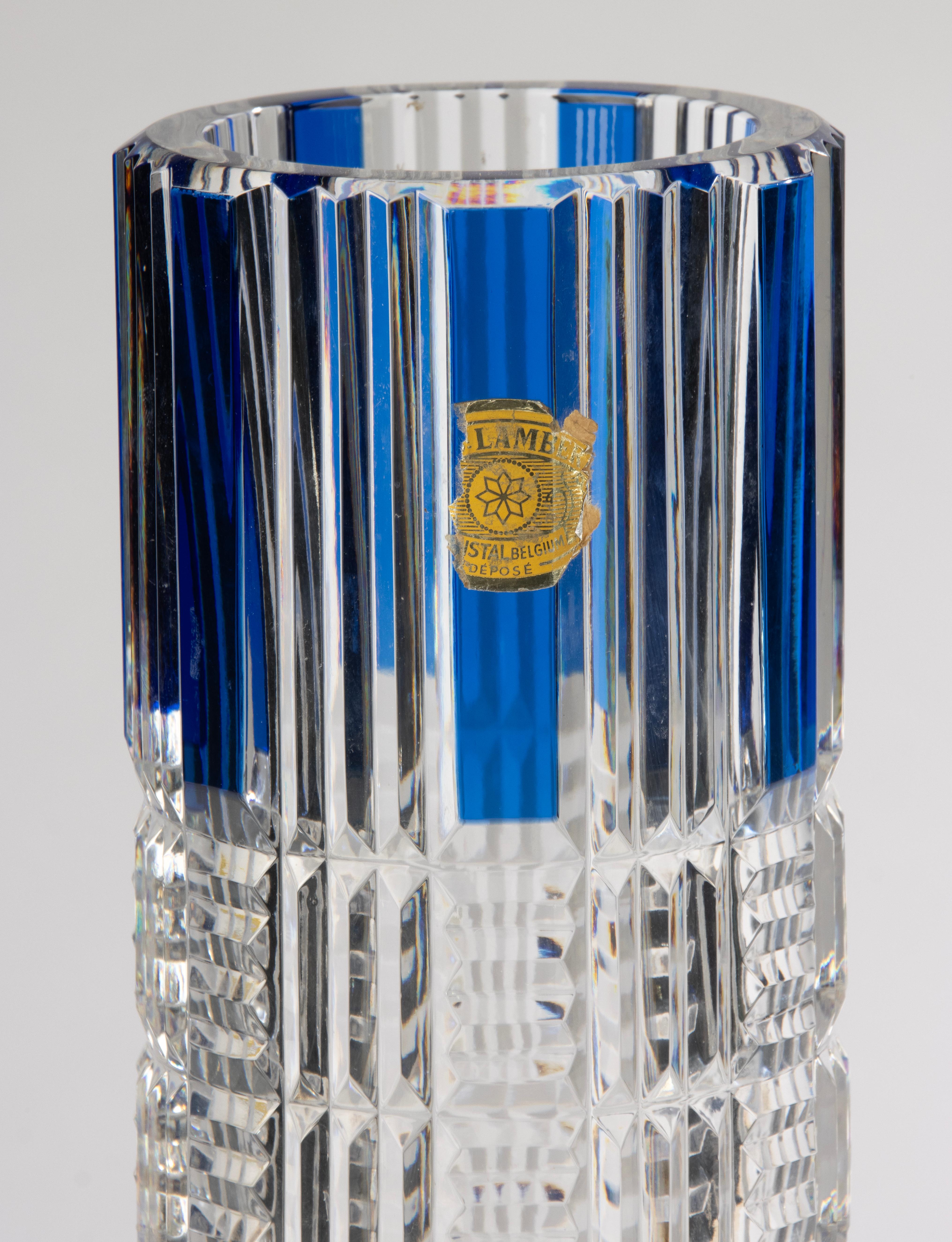 Beautiful Val Saint Lambert crystal table lamp from the 1970s.
This striking piece features exquisite geometric cut crystal with a deep blue overlay, creating a stunning contrast and sparkle. The lamp has an elegant cylindrical form and showcases