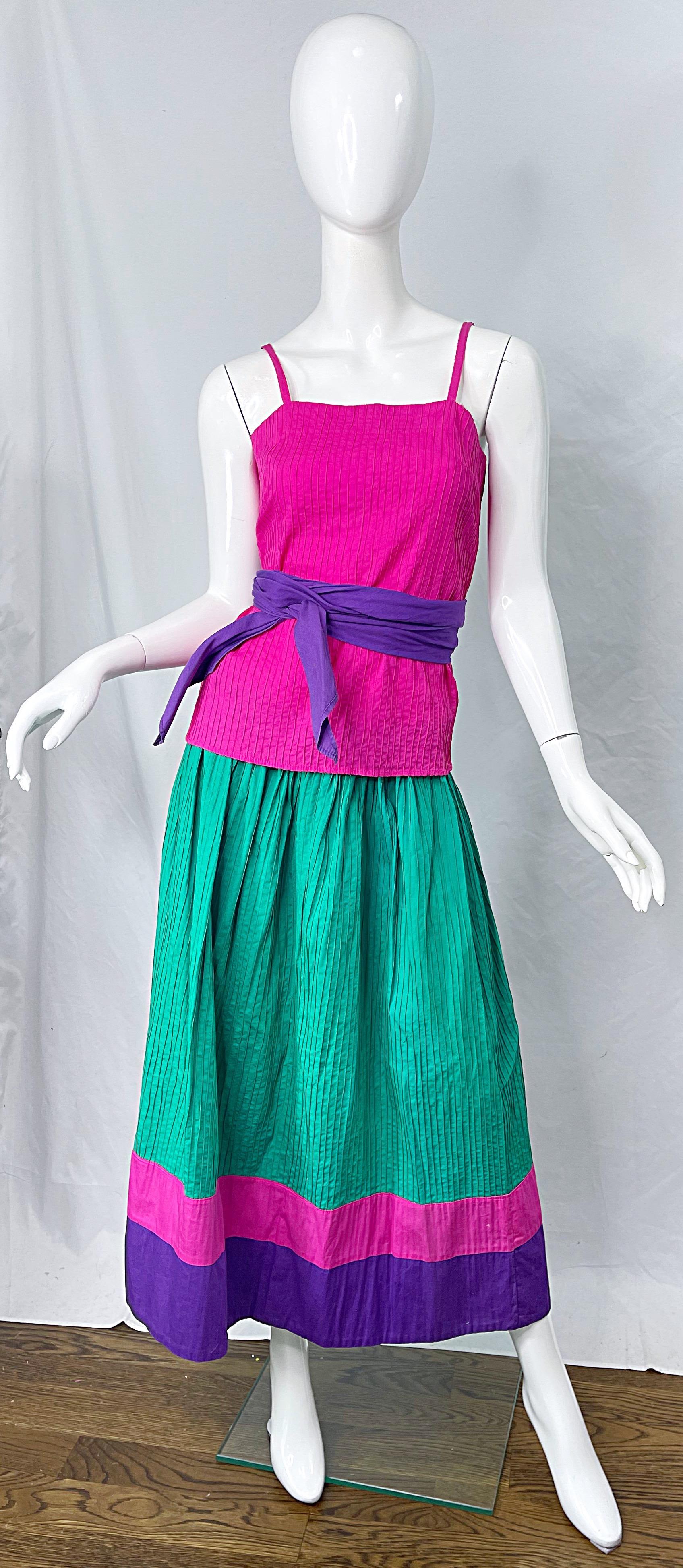 Chic late 70s TACHI CASTILLO 4 piece cotton dress ensemble ! 
Set includes:
-Hot pink sleeveless tank top with buttons up the back
-Green blouse with purple under the sleeves
-Purple obi sash belt
-Green skirt with elastic waistband 
All four pieces
