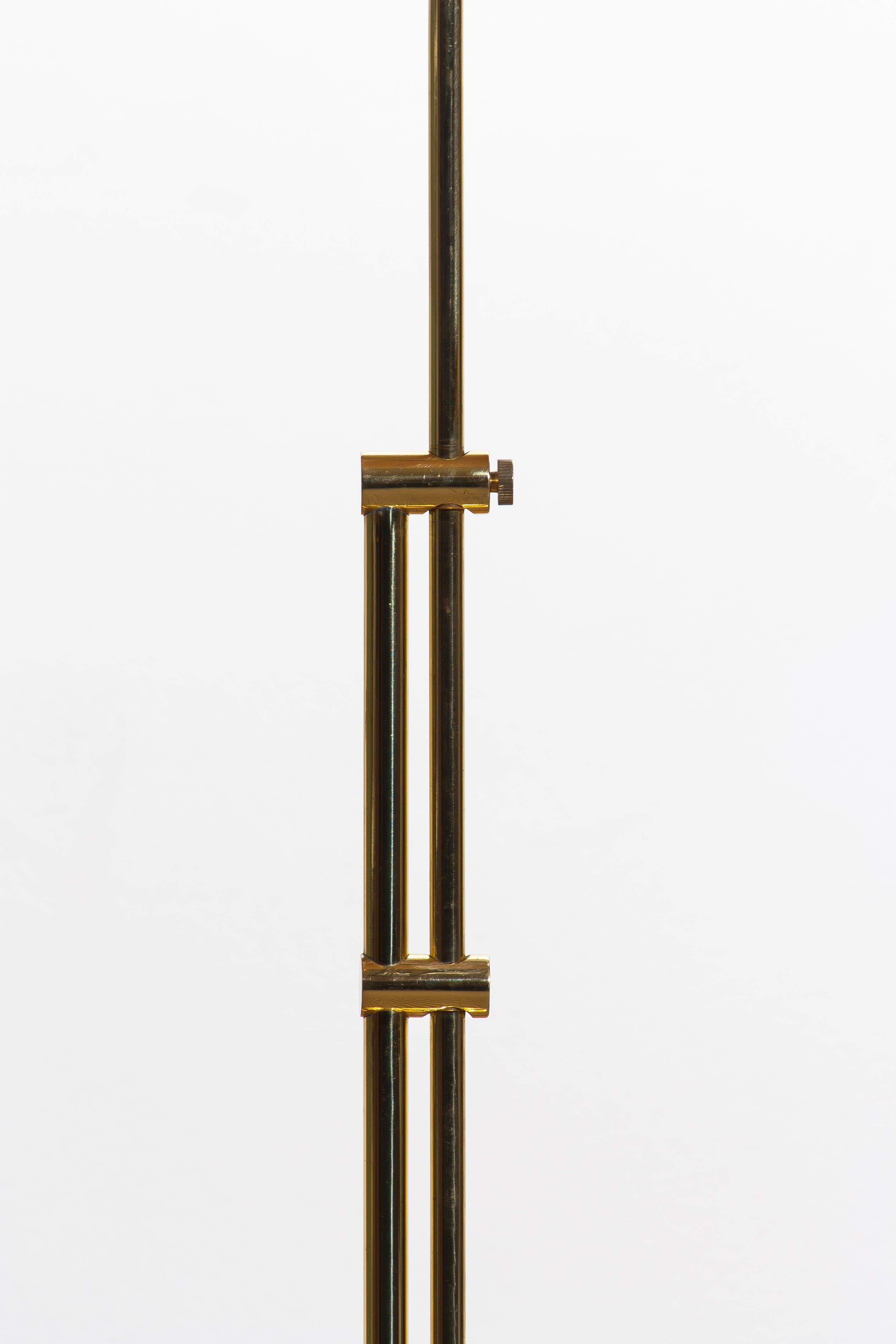 Beautiful tall brass Hollywood Regency swing arm floor lamp. 
Newly wired and fitting. Size E27/28 for Europe and US.
Period 1970.
Height is adjustable from 110 - 155 cm / 43 - 61 Inch.
ø Floor stand: 23 cm / 9 inch
We have two stands on stock!