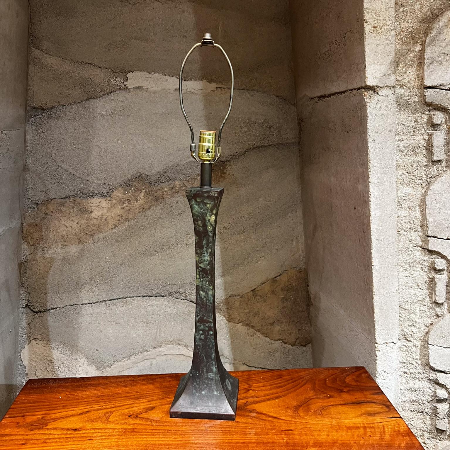 1970s Tapered Table Lamp in Bronze Stewart Ross James for Hansen
Special patina of turquoise, green and black.
22.75 h x 5.5 x 5.5
Preowned Original vintage condition.
Wear consistent with use and age.
No shade is included.
Please refer to images