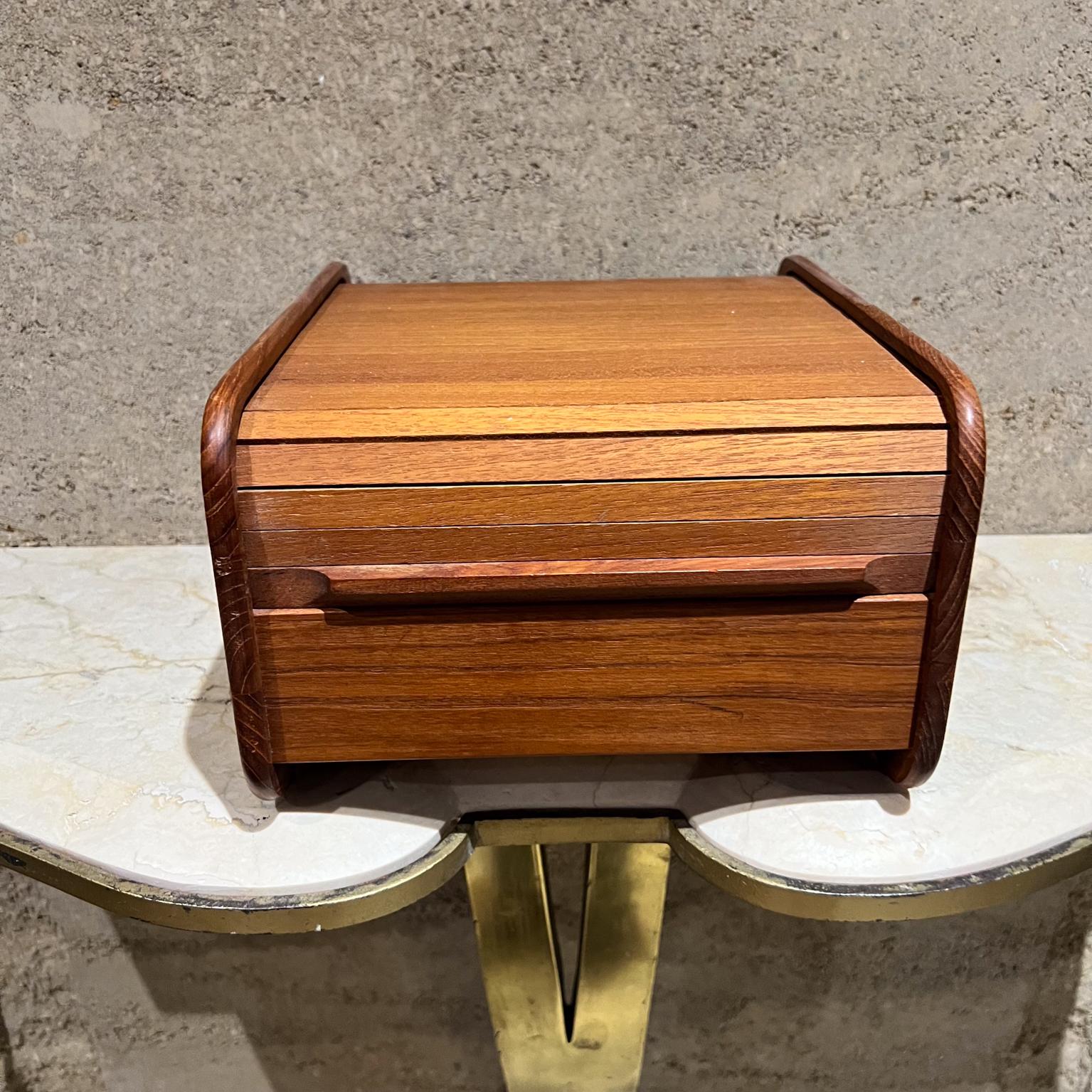 
1970s Cassette Holder in Teakwood Tambour Door
by Teak Tech Dallas made Thailand
8.38 w x 11 d x 6.25 h
Preowned original vintage condition.
See images please.