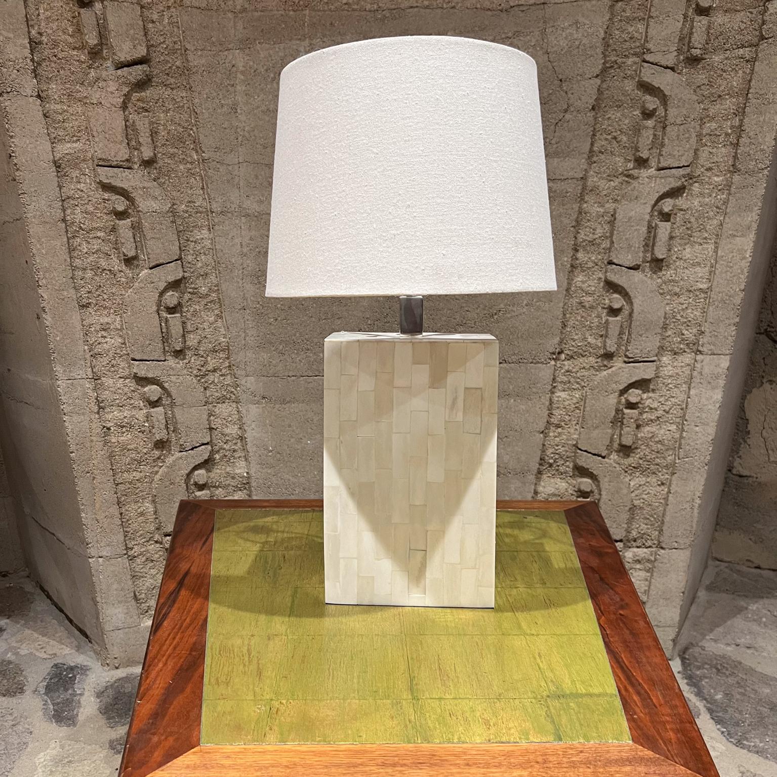1970s Tessellated Bone Table Lamp Enrique Garcel Colombia
17 h to socket 24 h to finial 7.75 w x 4.25d
Enrique Garcel (in the style of Karl Springer + Maitland Smith)
Preowned original unrestored vintage condition
No shade is included
Refer to all