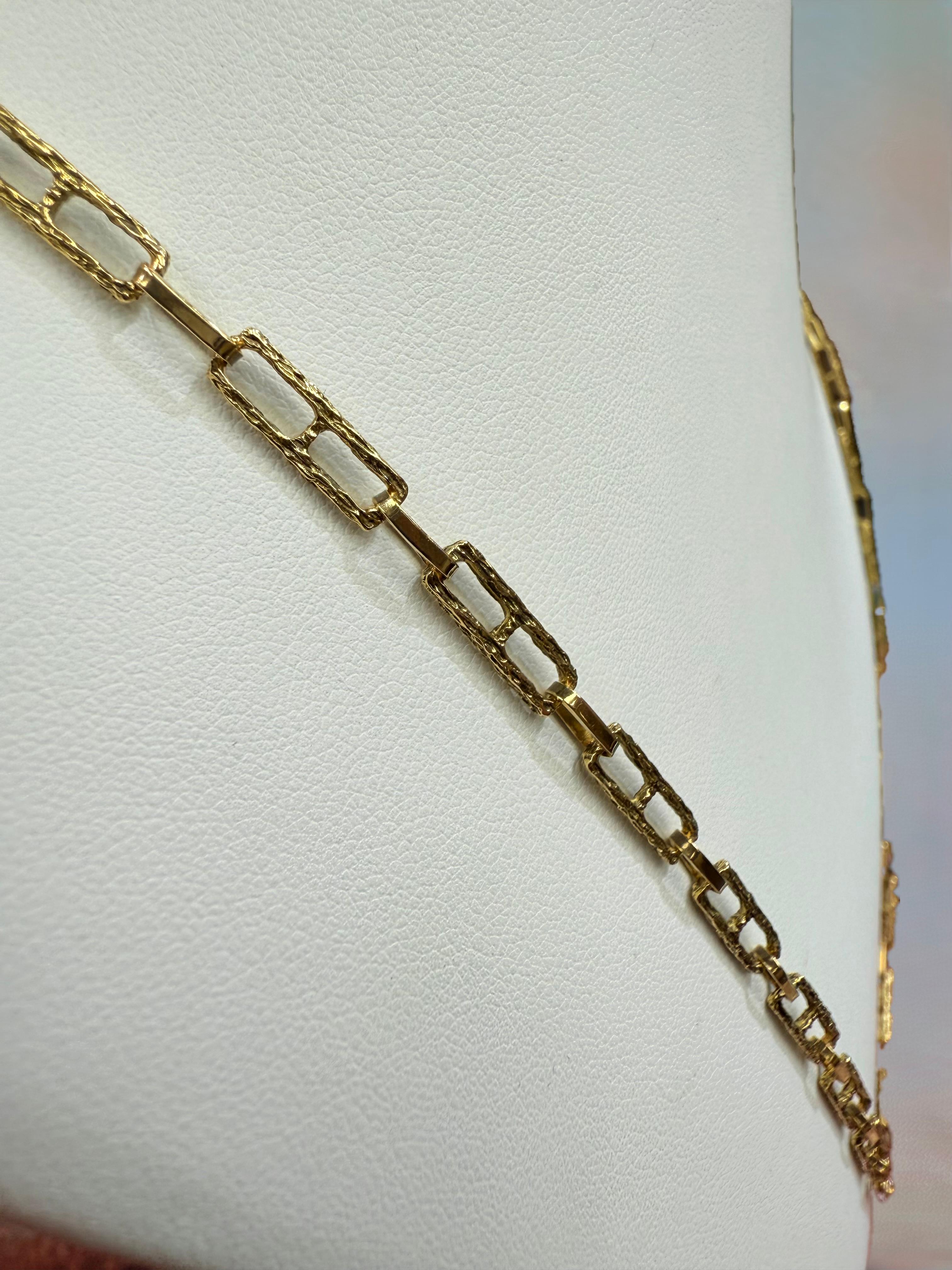 1970s Textured 18k Yellow Gold Link Chain Necklace.

This 18k Yellow Gold Textured Link Chain Necklace was made in the 1970s.  Designed as rectangular textured nautical links connected with smooth links to make this marvelous 30