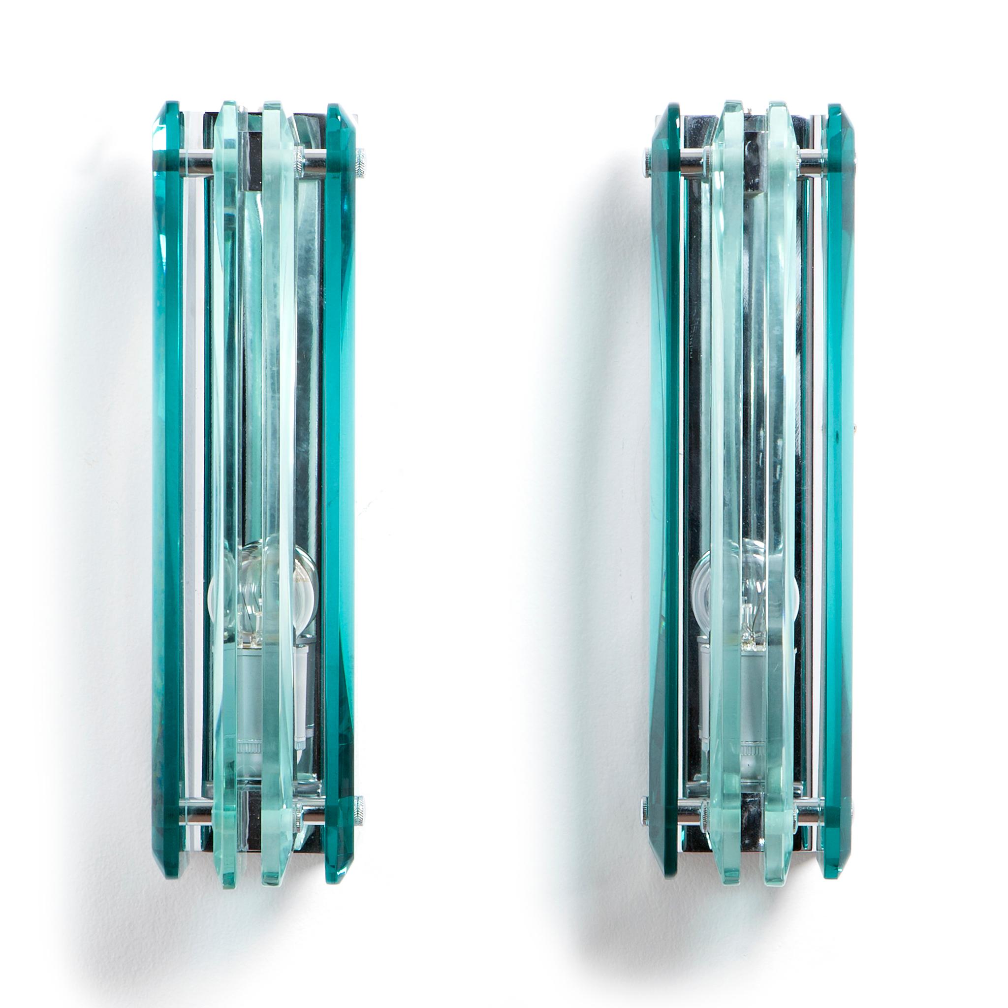 Italian 1970s Thick Glass and Chrome Sconces Attributed to Cristal Arte For Sale