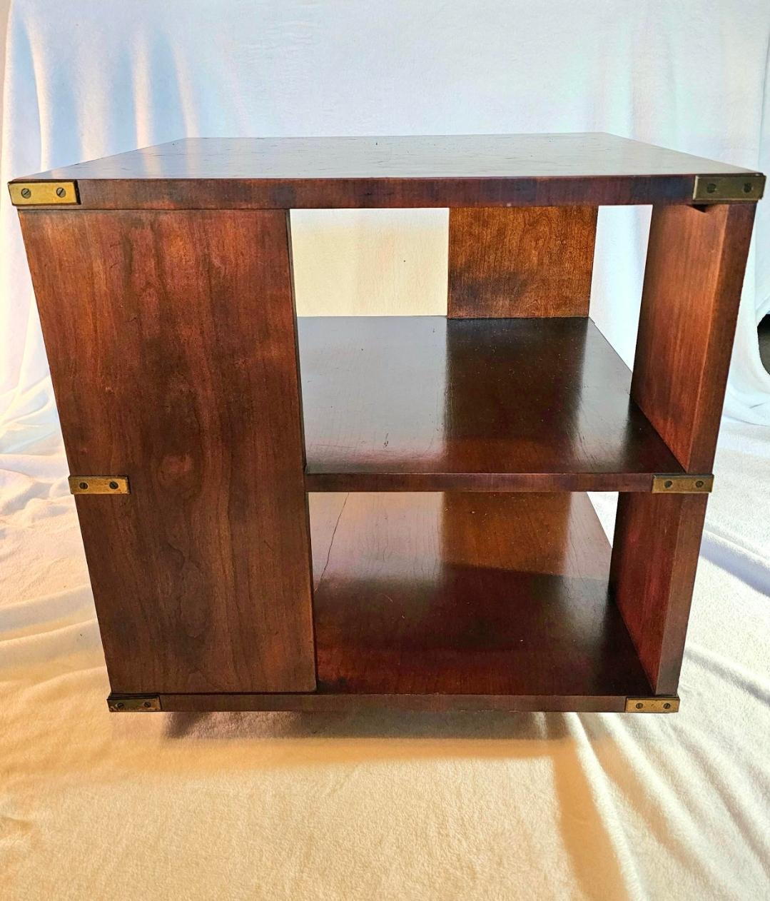 DOB 1970
Rare, I've not been able to find another one.
Thomasville solid wood campaign style revolving bookcase.
Classic campaign brass bands.
Solid wood, no veneers.
Smooth motion in the base.
Perfect cube 22