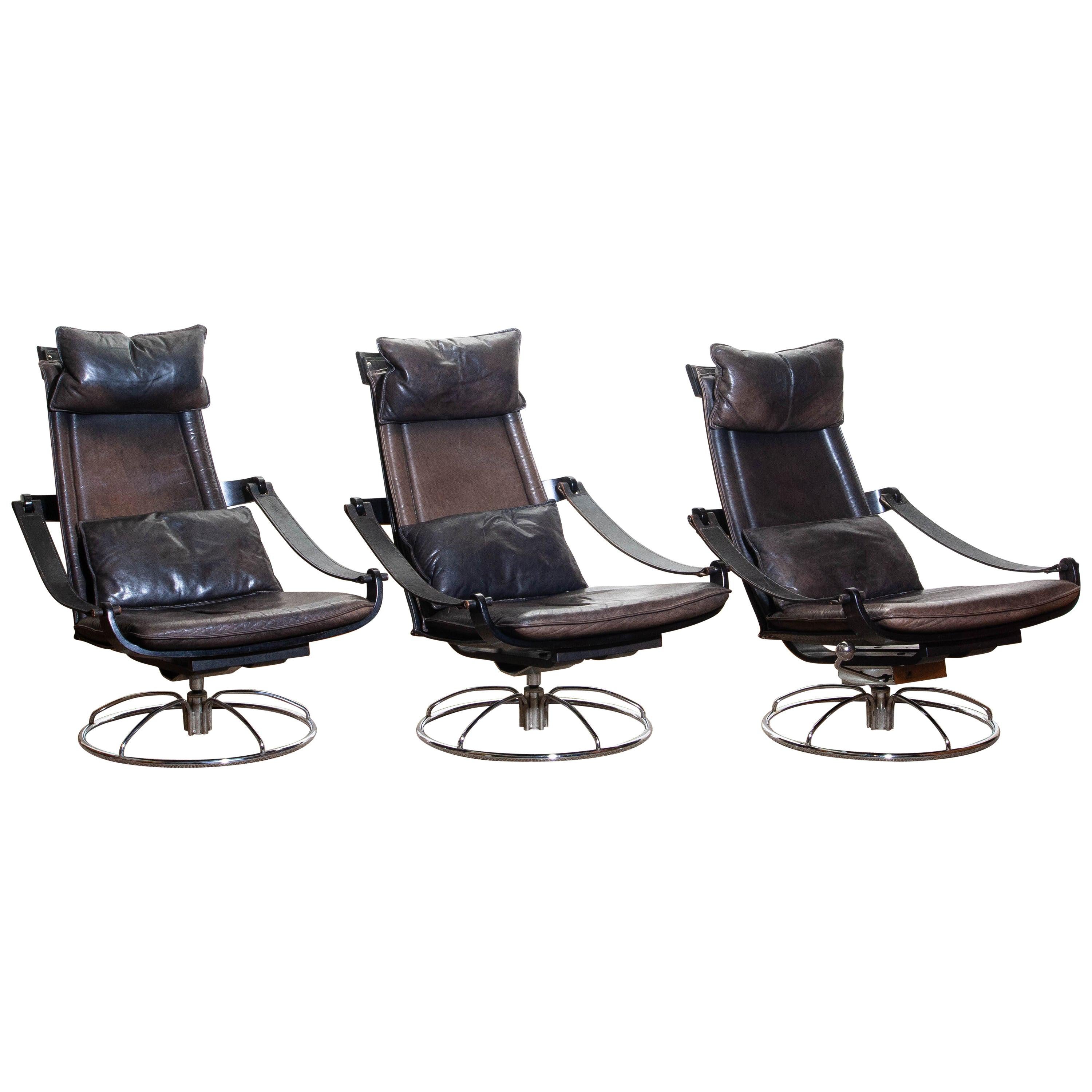 Swedish 1970s, Three Leather Swivel / Relax Chairs by Ake Fribytter for Nelo, Sweden