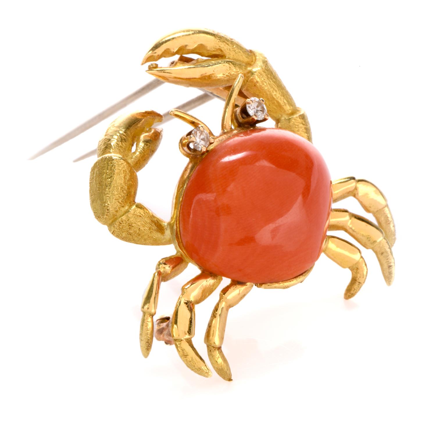 This excusite 1980's Tiffany and Co lapel pin displays a sand crab design motif and is crafted in bright glowing 18k gold.
The brooch commands attention with a beautiful cabochon cut oval shaped genuine coral as the
center focus and body and then