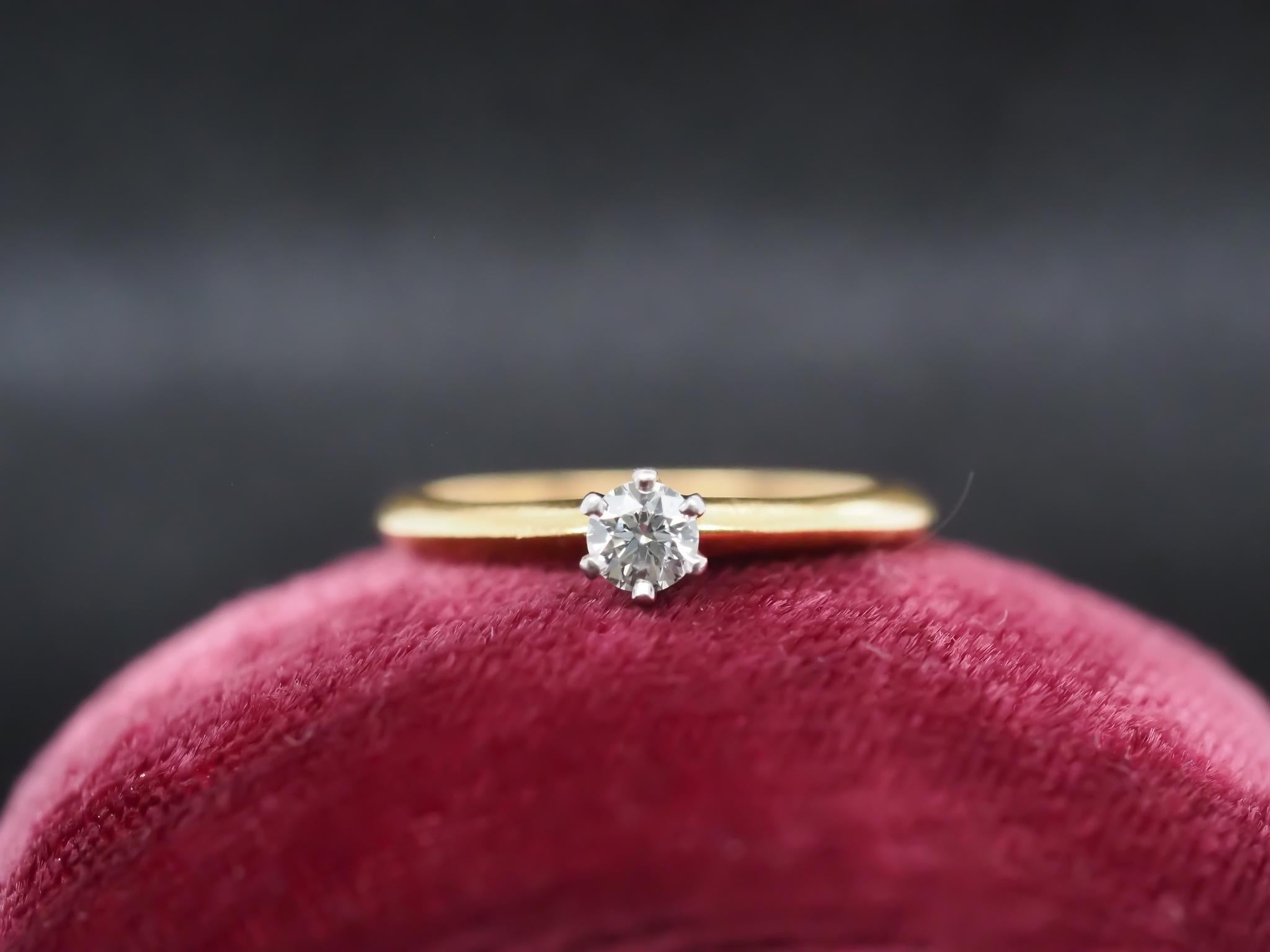 Year: 1970s
Item Details:
Ring Size: 5.75 (Sizable)
Metal Type: 18K Yellow Gold and Platinum [Hallmarked, and Tested]
Weight: 2.6 grams
Diamond Details: .19ct, Round Brilliant, F Color, VS clarity, Natural Diamond.
Side Stone Details:
Band