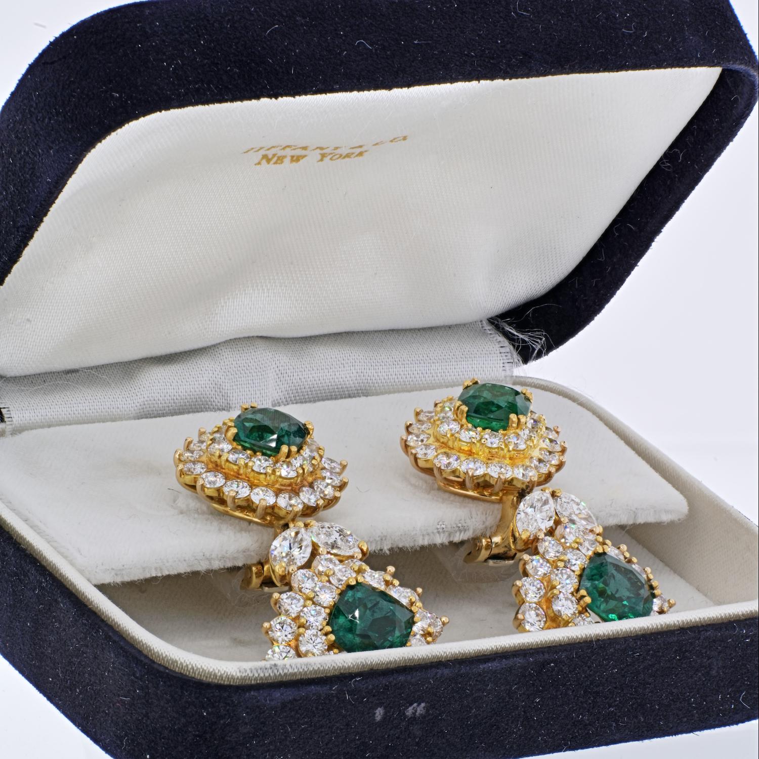 Centered by four perfectly matched green Zambian Emeralds totaling 9.08 Carats, accented by 112 Round-Brilliant Cut Diamonds totaling 12-13 Carats, and set in lush 18K Yellow Gold. These stunning earrings from Tiffany & Co are among their finest