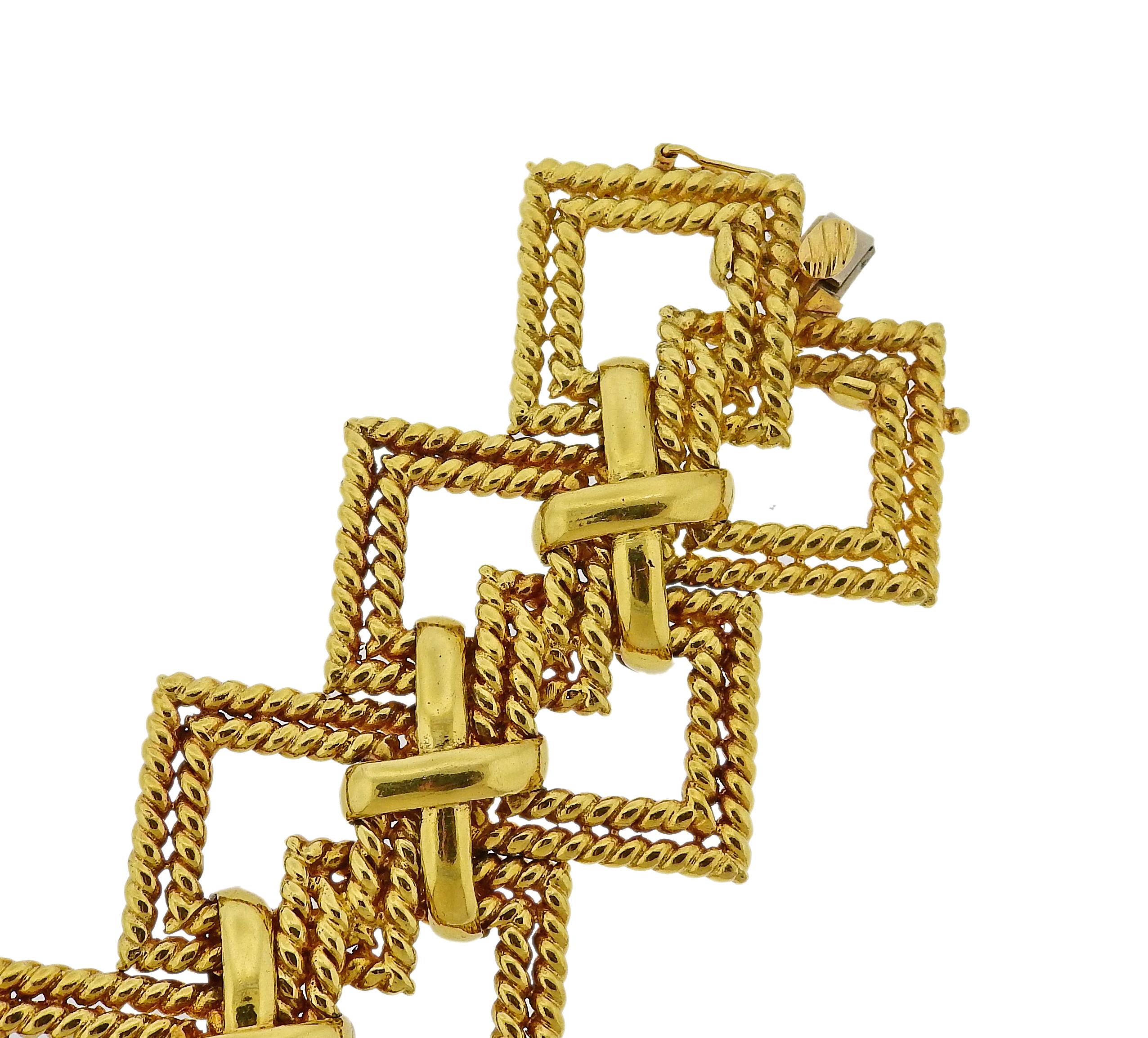 Massive 18k yellow gold wide x bracelet by Tiffany & Co, crafted in circa 1970s. Bracelet is 7.75
