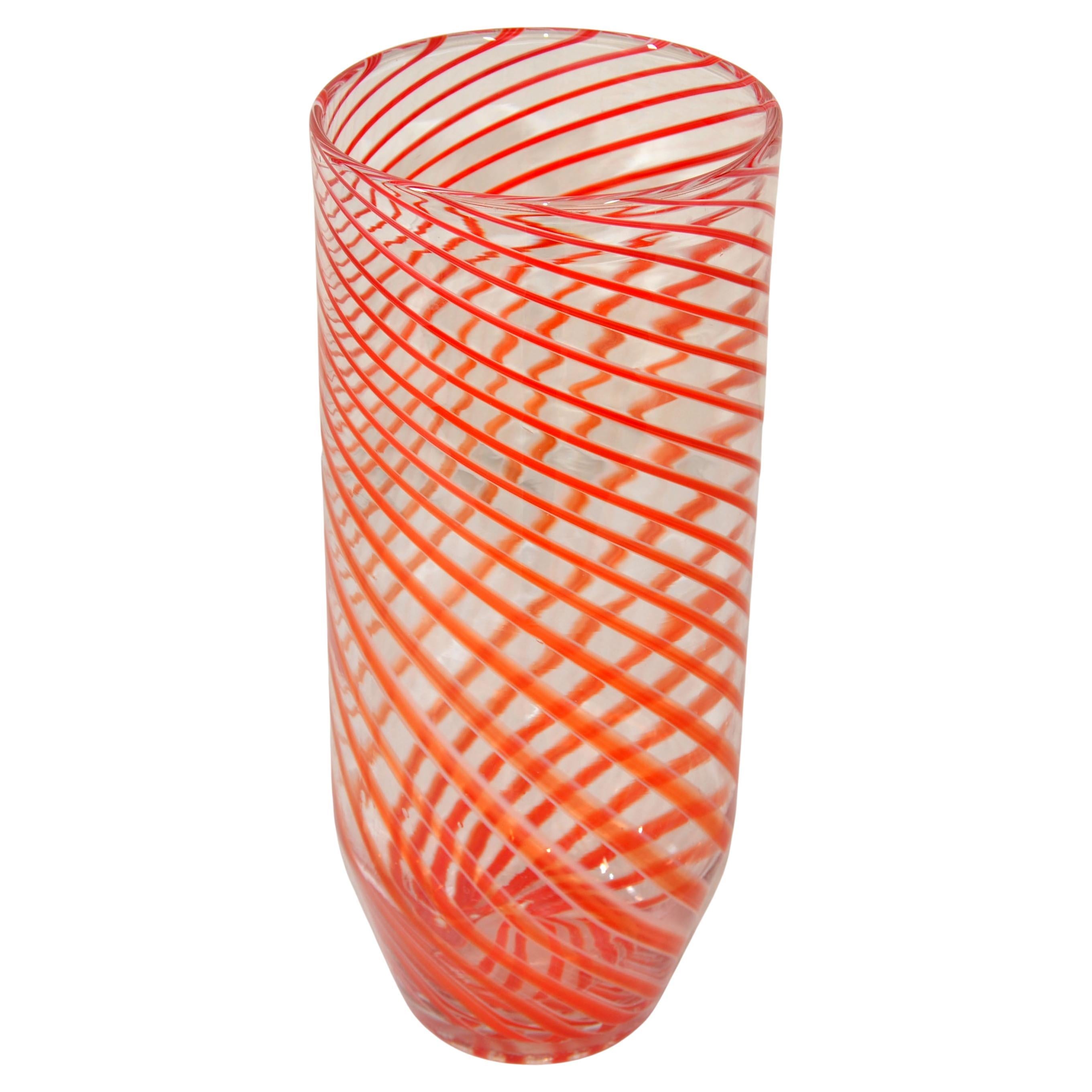 Tall Tommaso Barbi attributed Italian Mid-Century Modern blown Art Glass Murano Vase or Vessel in a candy swirl design motif with red and clear coloring.
Striking Murano glass vase for display or on your festive Table Setting at Family, Friends