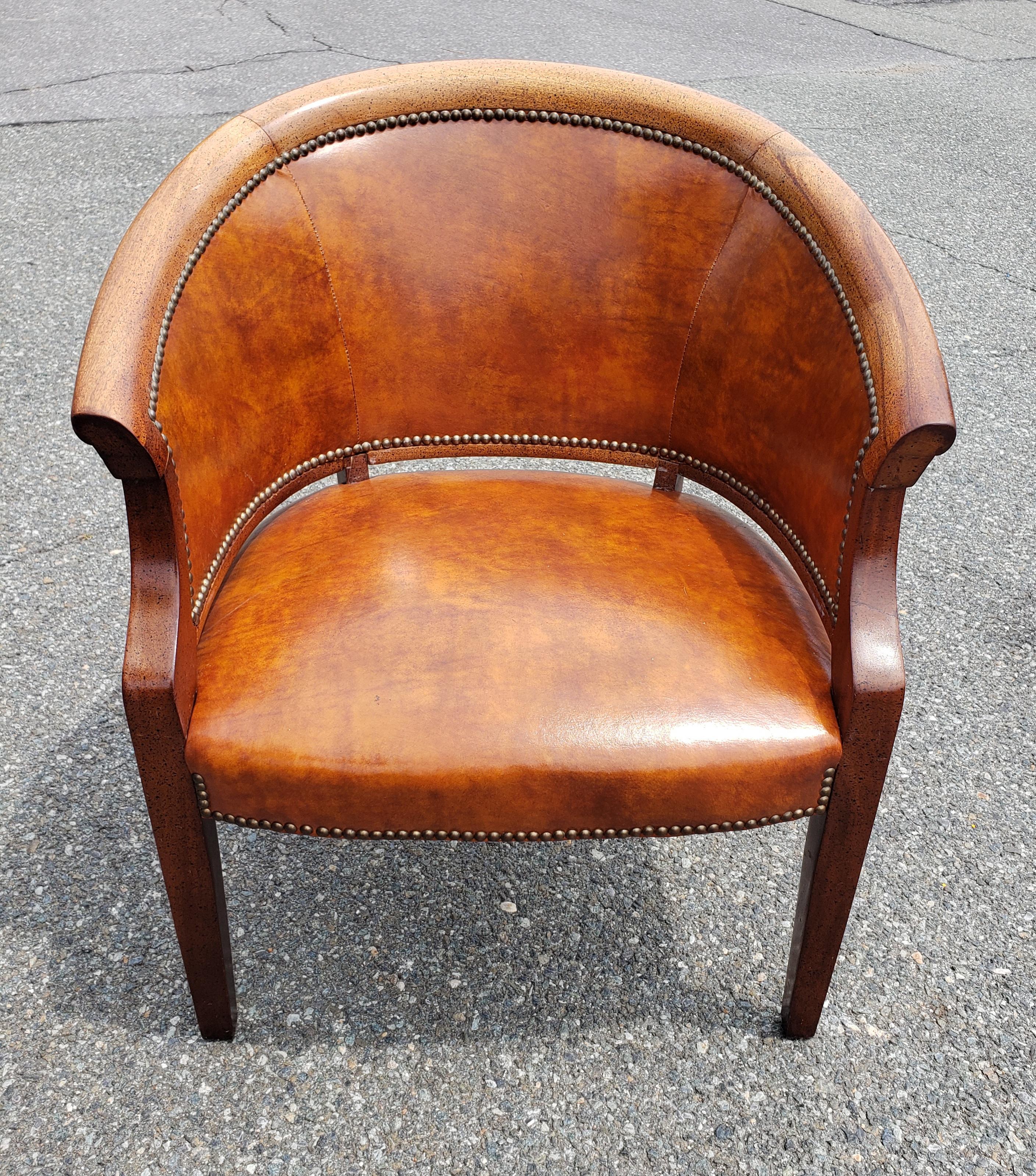 A magnificent Mid-Century, Top Grain Leather Barrel Back with NailHeads Trims desk Chair by Classic Furniture. Great vintage condition. Measures 27