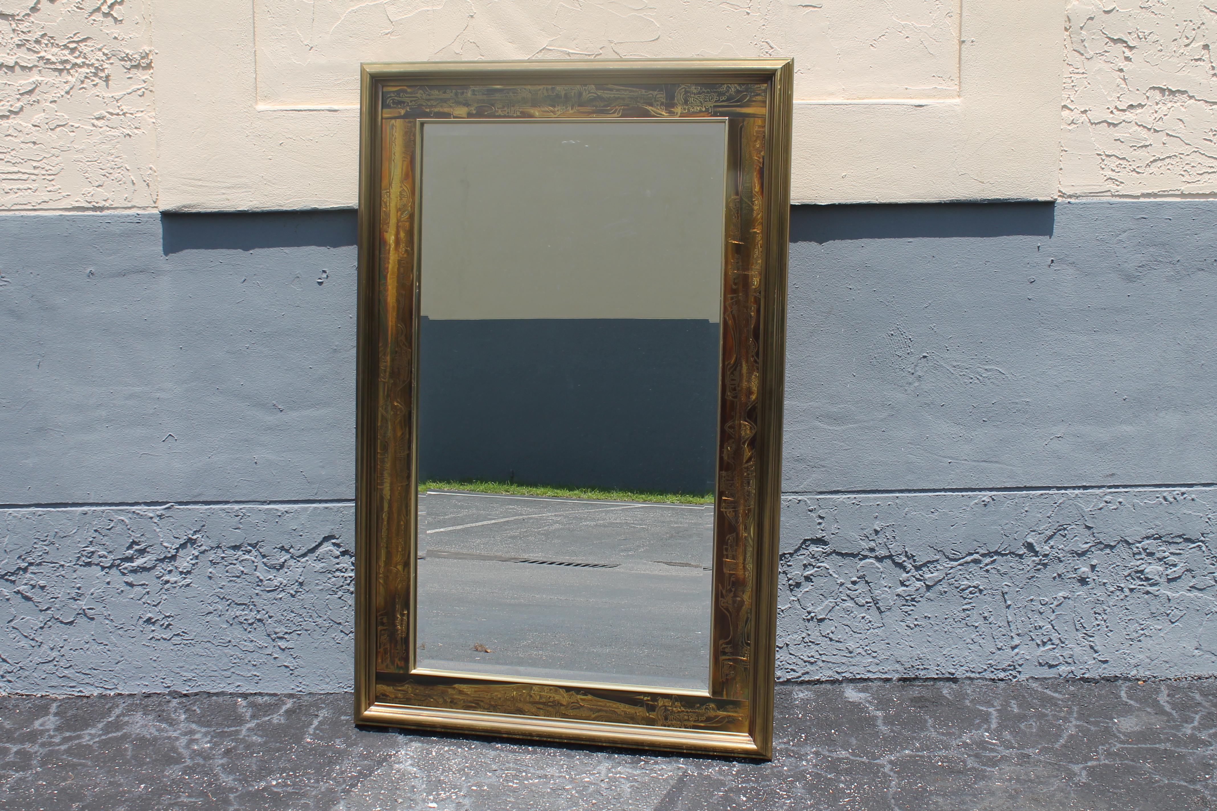 1970's Traditional style Wall Mirror attributed to Mastercraft. Decorated wood and a substantial wall mirror. Miami Beach estate acquisition.