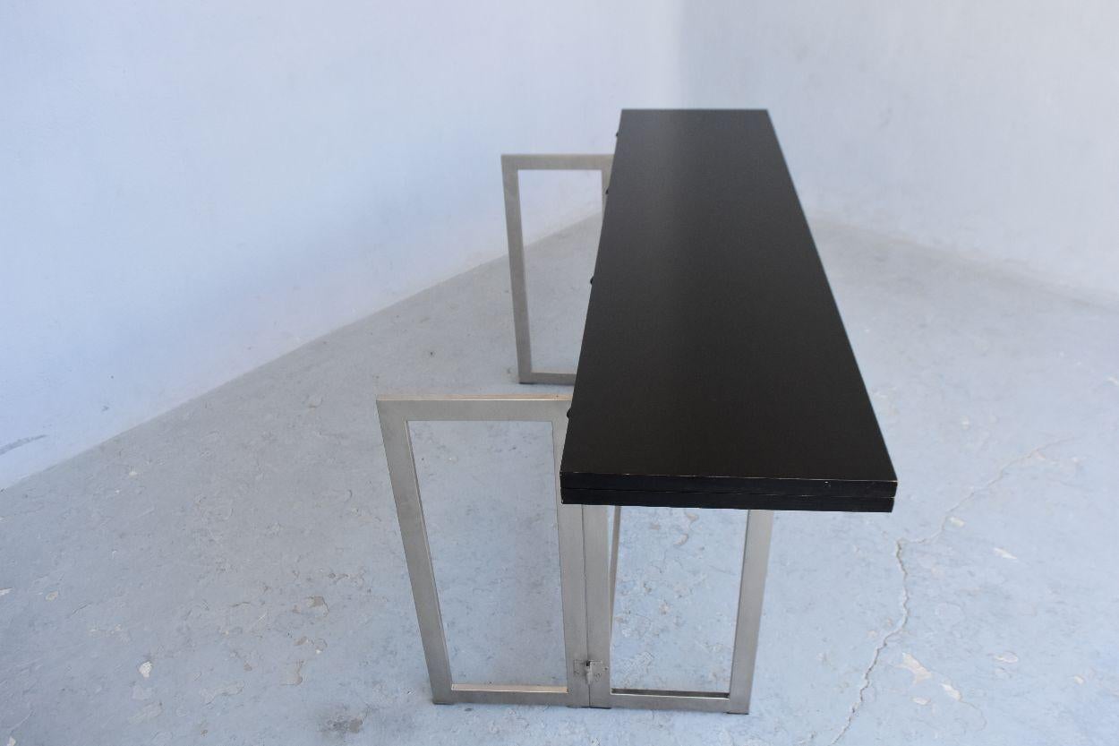 1970's vintage console table with system chromed metal and white oak by Artelano (Italy). Can be used as a console or when the base is deployed and the unfolded platform can be used as a table.