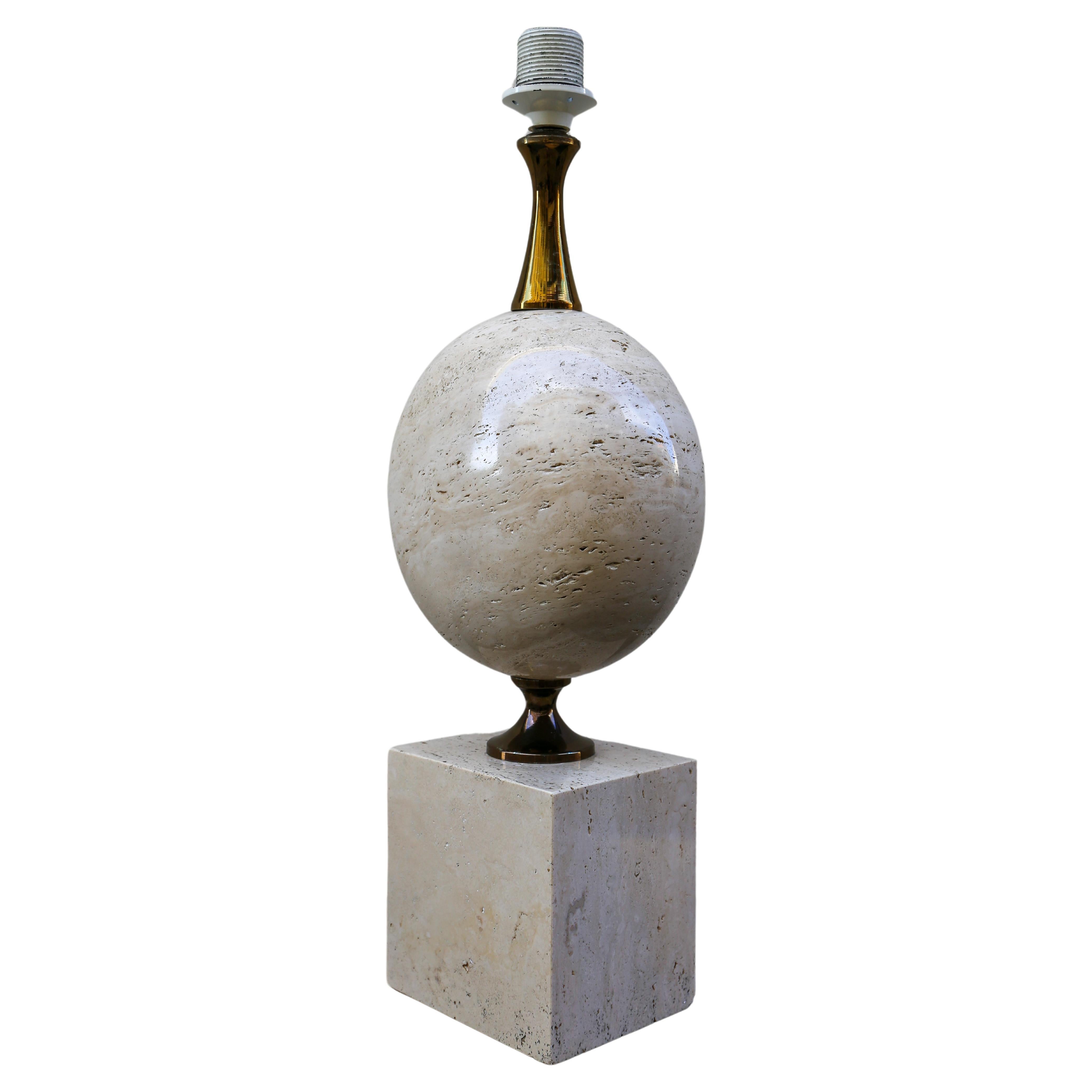 1970s Large Travertine Floor Lamp design by Philippe Barbier for Maison Barbier Paris France.

In the pure decorative spirit of 1970, very beautiful lamp by Philippe Barbier designer in travertine and brass.
Elegant table / living room lamp composed