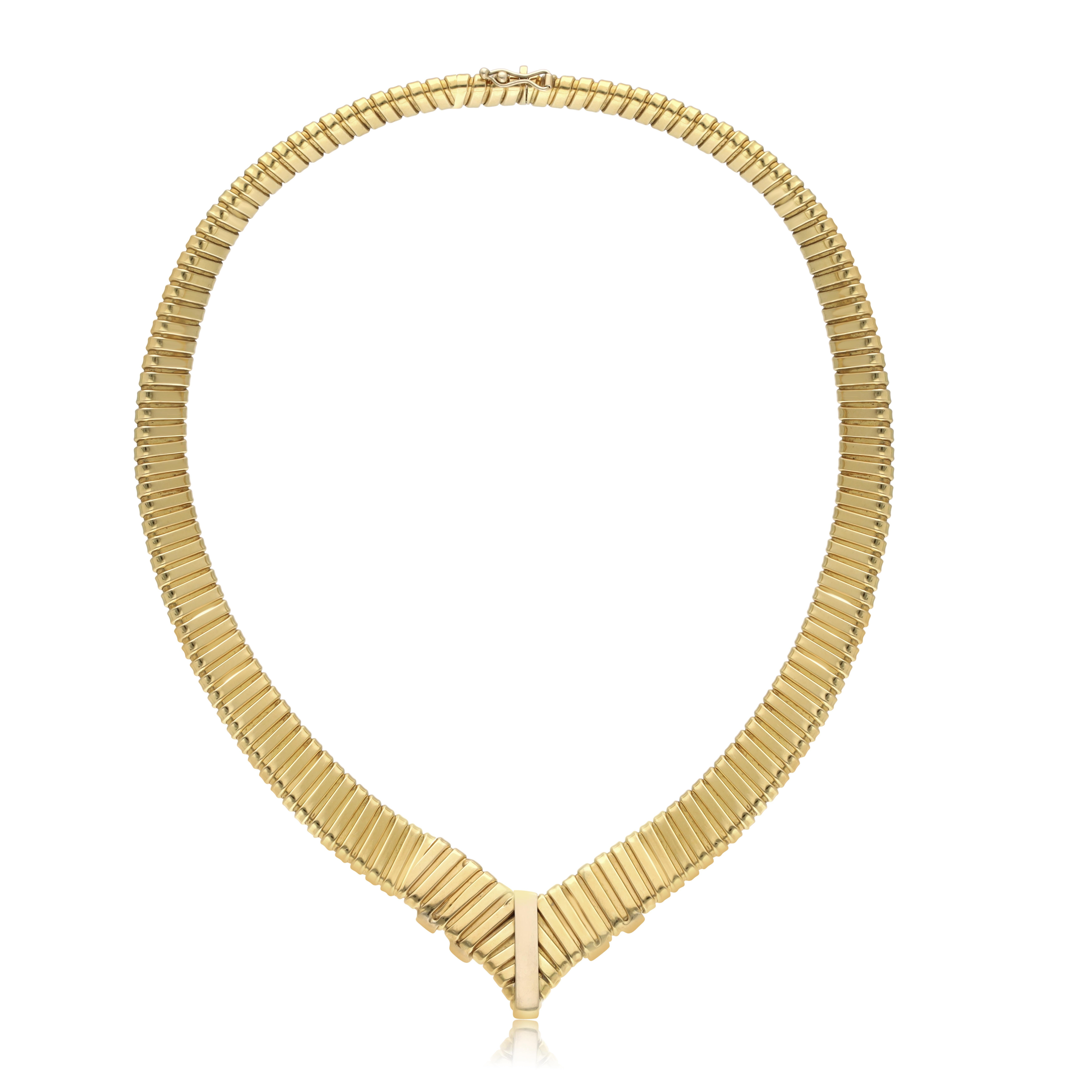 This timeless piece is a luxurious statement of refined elegance. Crafted from 18k gold in the distinct tubogas style of the 1970's, the necklace is adorned with a crowning glory of 1.1 carats of dazzling diamonds. Enhance any look with this