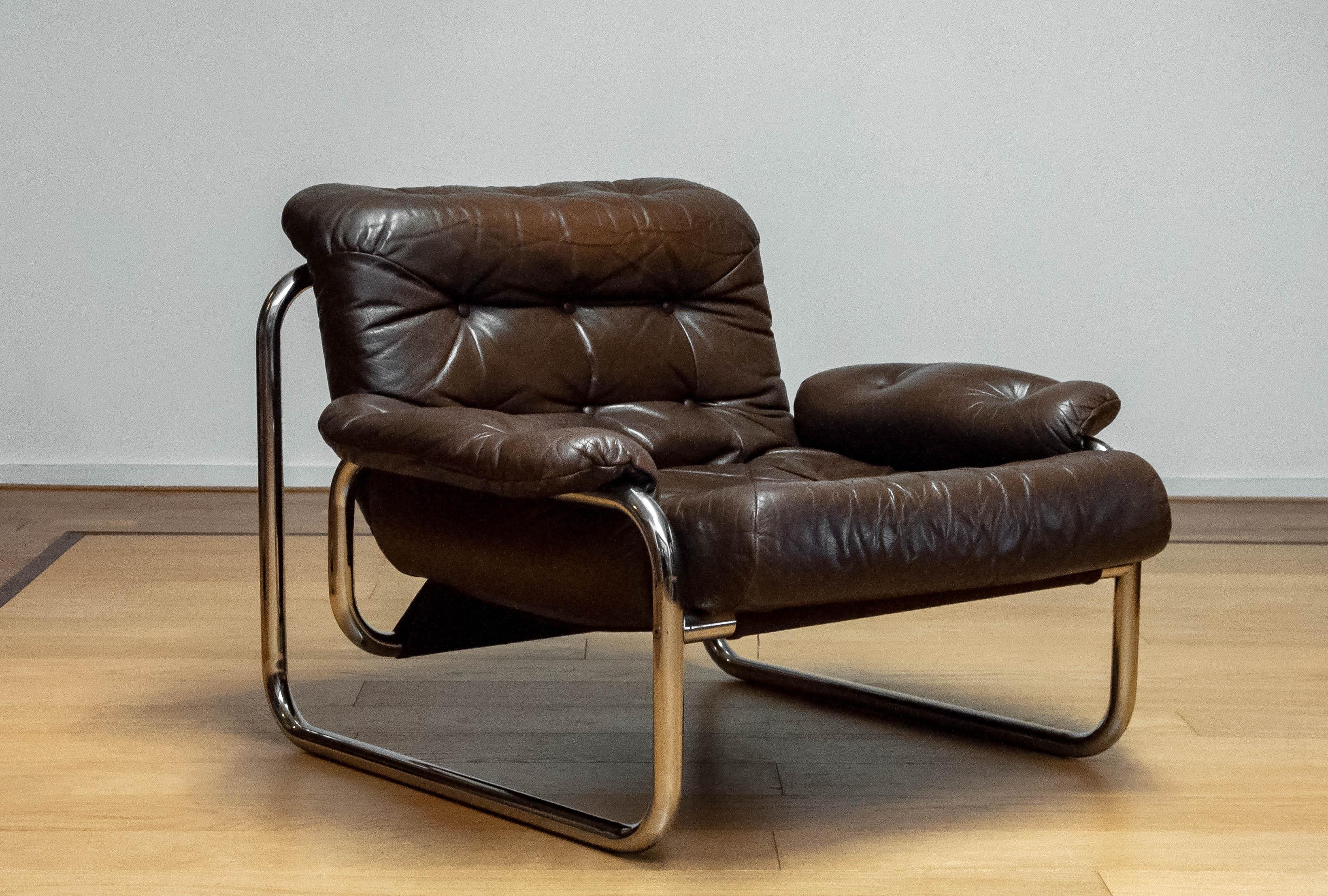 Scandinavian Modern 1970s, Tubular Chrome and Brown Leather Lounge Chair by Johan Bertil Häggström
