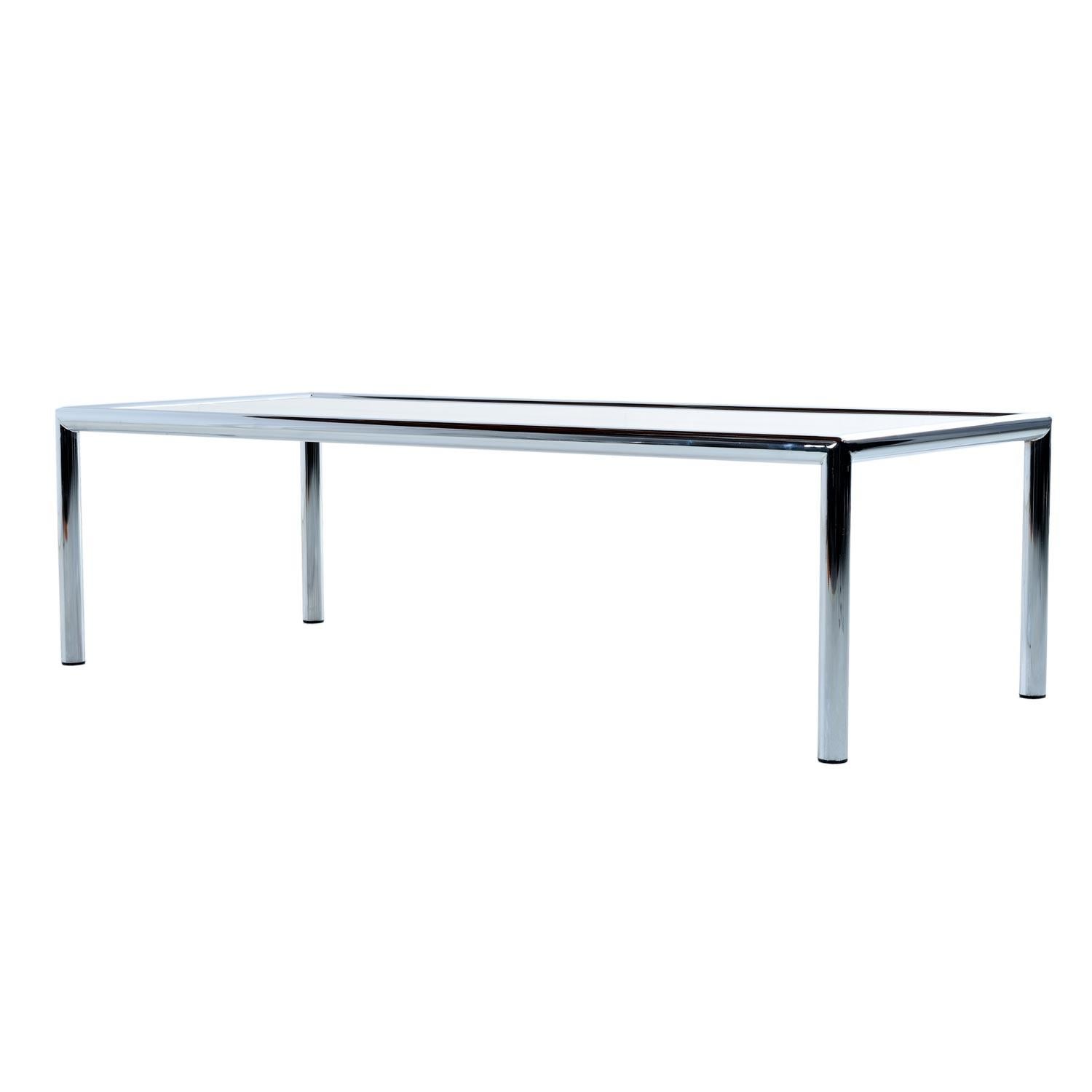 You won't find a finer example of this splendiferous coffee table anywhere. Designed for Design Institute. The tubular chromed aluminum frame creates colossal strength while keeping weight to a minimum. The polished finish contrasts perfectly