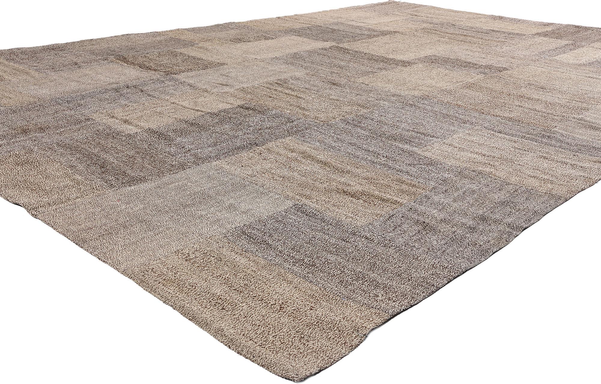 50370 Vintage Turkish Patchwork Kilim Rug, 09'09 x 14'00. Composed like a quiet symphony of earth and wool, this handwoven wool vintage Turkish patchwork kilim rug offers a grounded beauty born of tradition and time. Each patch, lovingly repurposed