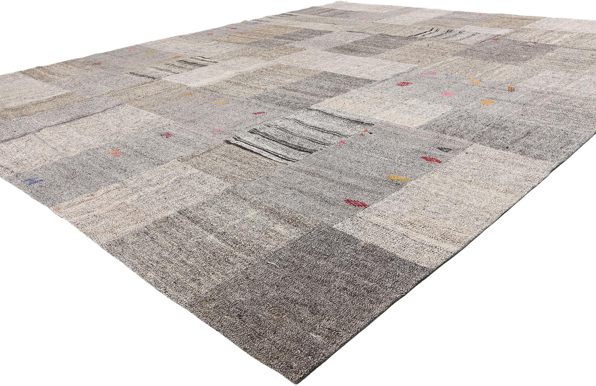 53167 Vintage Turkish Patchwork Kilim Rug, 11'05 x 13'11. Woven from the quiet whispers of Anatolian pastures and the steady hands of Turkish artisans, this handwoven wool vintage Turkish patchwork kilim rug is a living anthology of timeworn beauty.