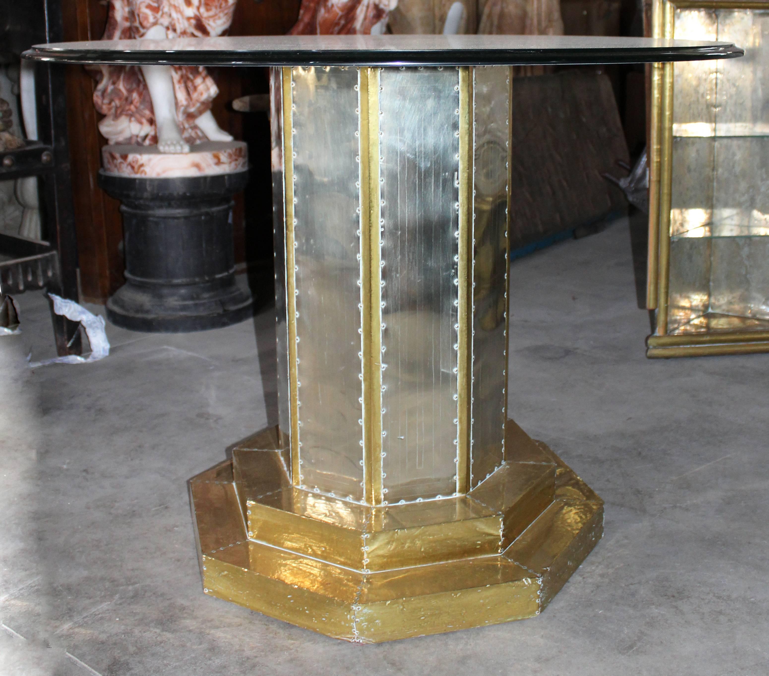 1970s Two-tone gilded brass on wood designer glass top table from Marbella, Spain. A time when the Argentinian furniture designer Rodolfo Dubarry set up a workshop in Marbella and popularised the use of gilded brass with a mix of European and