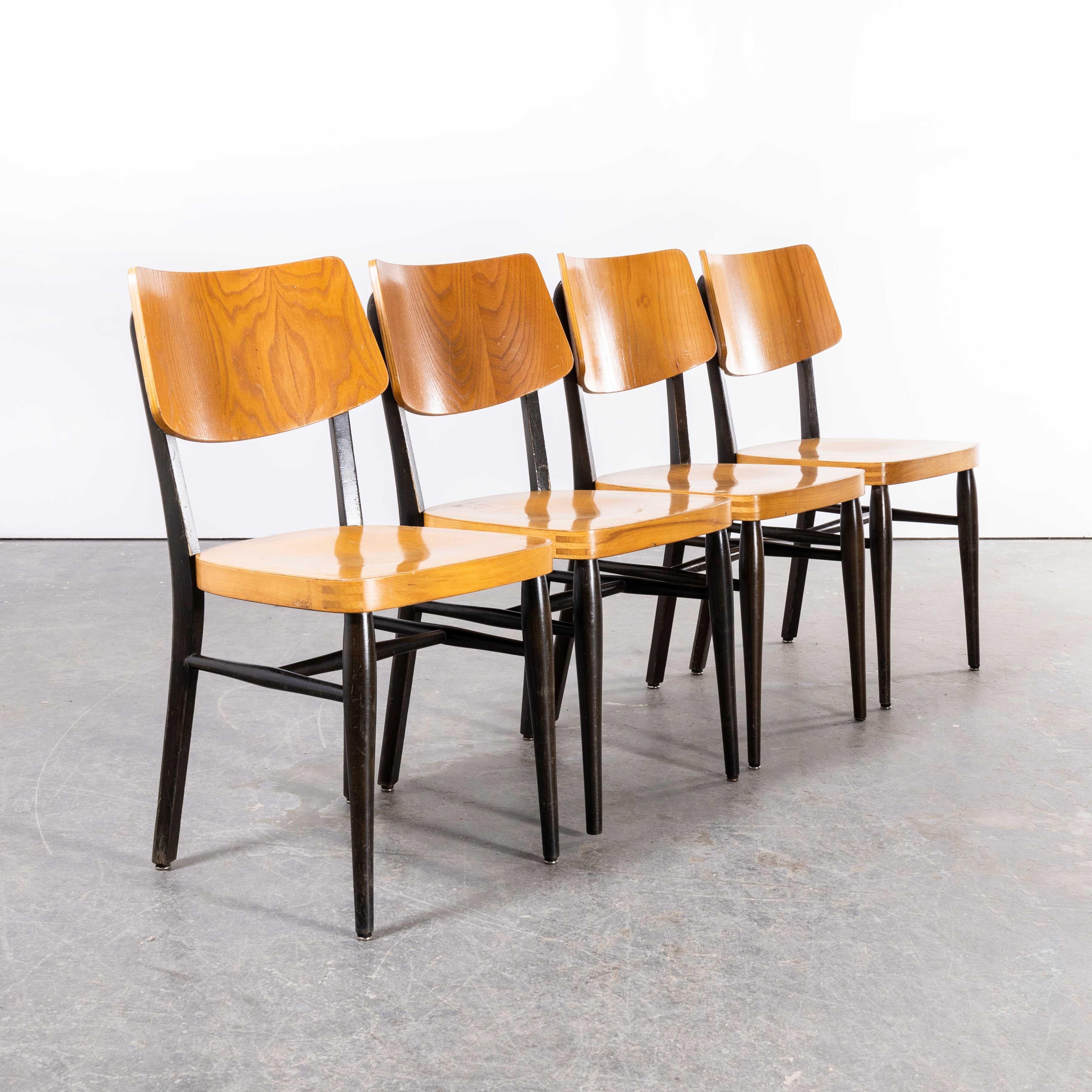 1970s two tone saddle back dining chair – set of four
1970s two tone saddle back dining chair – set of four. Sourced in central Germany we loved these chairs for their wide sculptural contemporary backs and two tone ebonized frames and oak seats