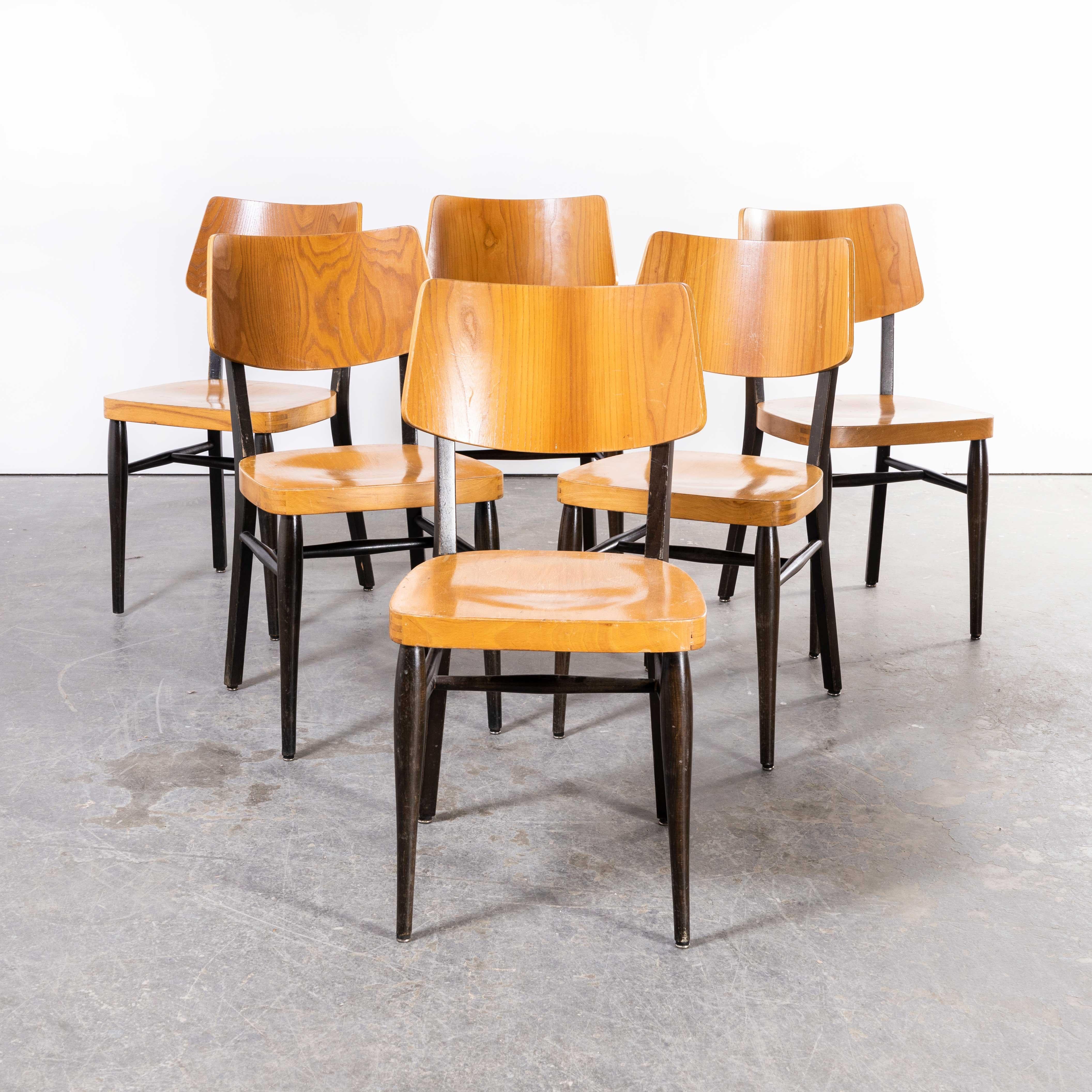 1970s Two tone saddle back dining chair – set of six
1970s Two tone saddle back dining chair – set of six. Sourced in central Germany we loved these chairs for their wide sculptural contemporary backs and two tone ebonized frames and oak seats and