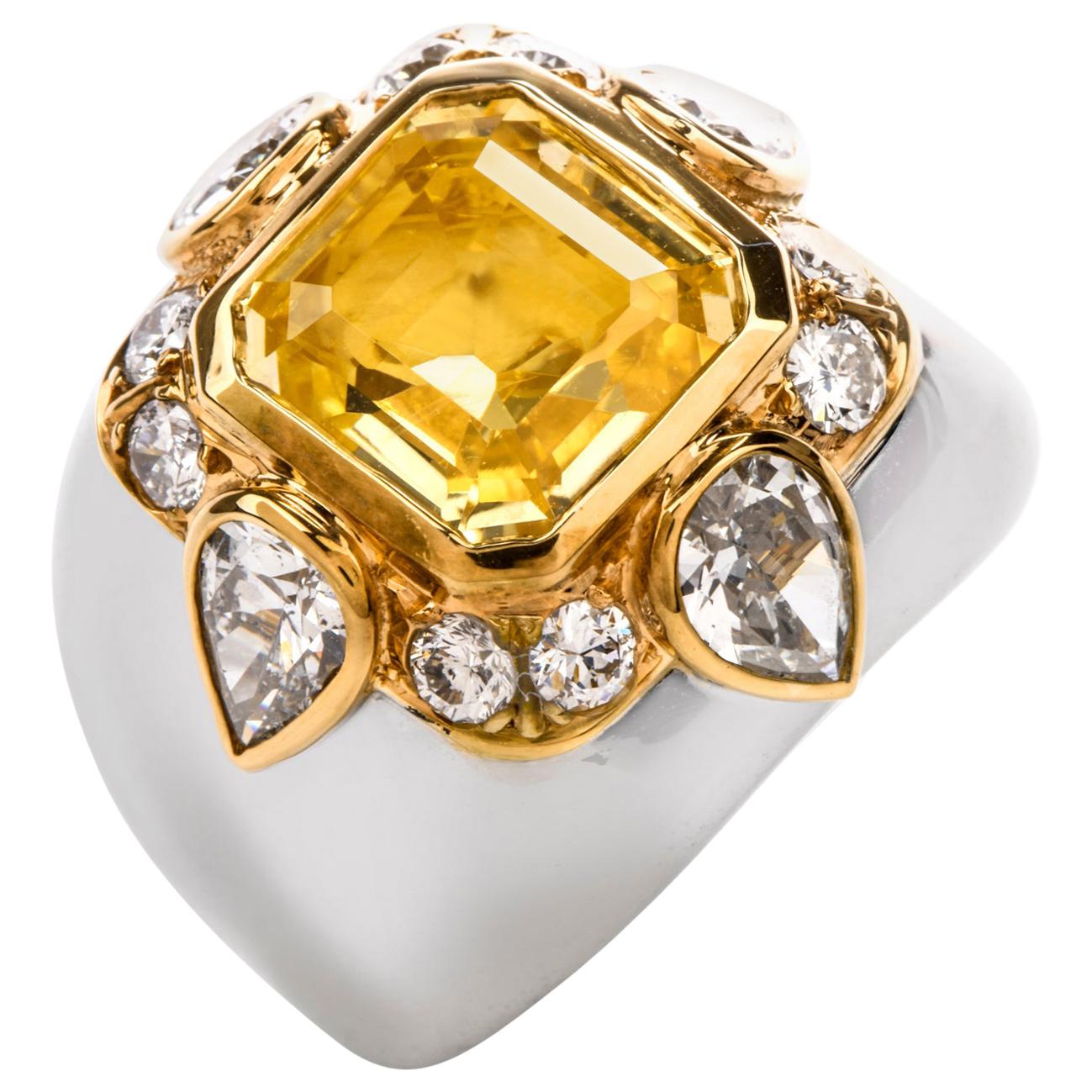 
This Pristine condition Diamond and  Yellow Sapphire cocktail Ring was inspired in a Dome motif and crafted in14K white Gold.
Adorning the center is a square emerald cut Natural Untreated Yellow Sapphire from Sri Luanka (Ceylon), 
measuring 10.57 x
