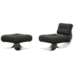 1970s Upholstery on Steel Base Lounge Chair with Ottoman by Oscar Niemeyer