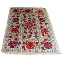 Alfombra Suzani de Uzbekistán de los años 70 en colores típicos