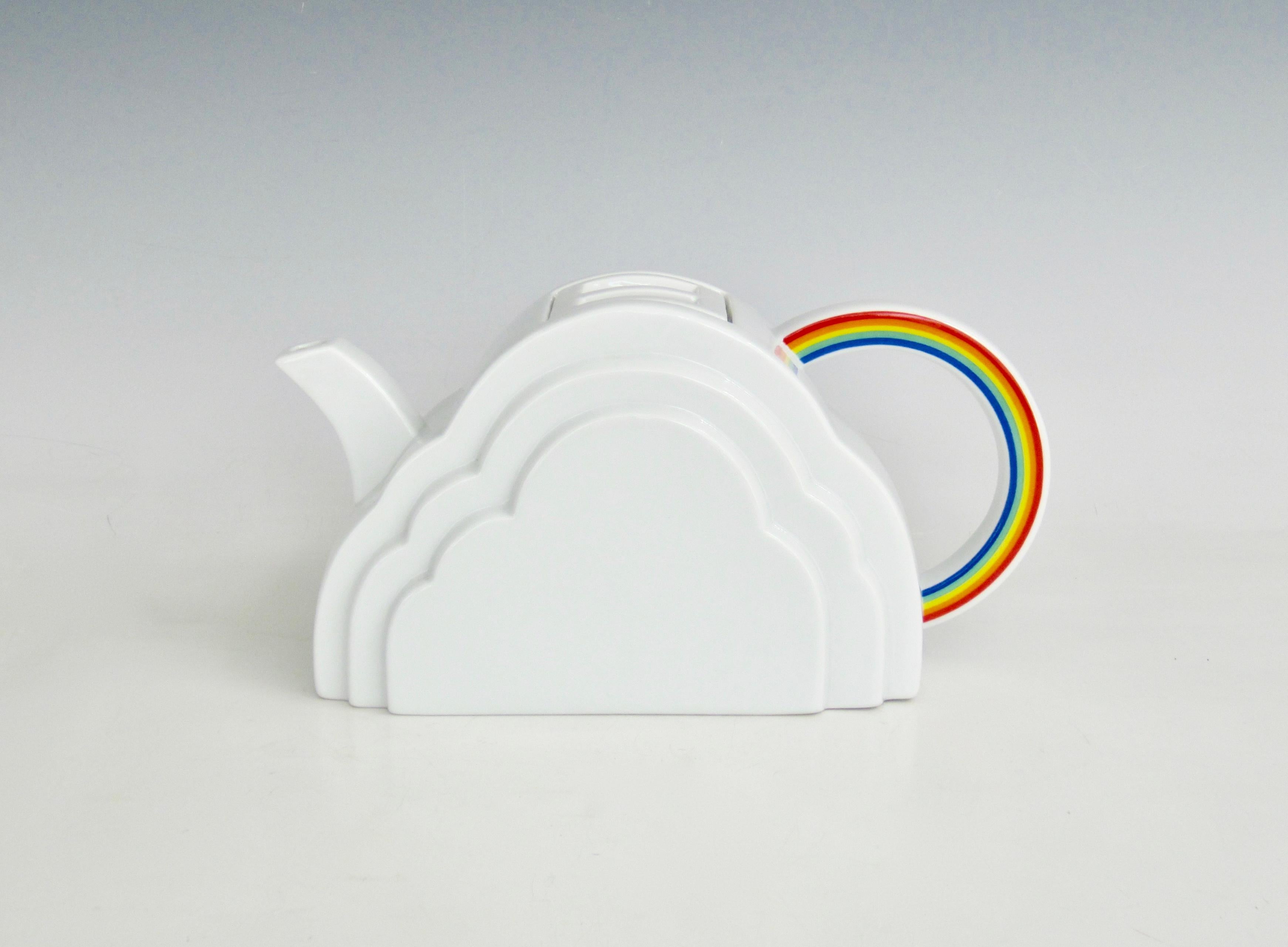 Vandor Imports of San Francisco Clouds and Rainbow Porcelain Teapot. Three tiers of bright white clouds form the base, belly, and shoulder of the pot with a 70's Pride colored rainbow handle. A cheerful teapot indeed. Good clean condition.

From his