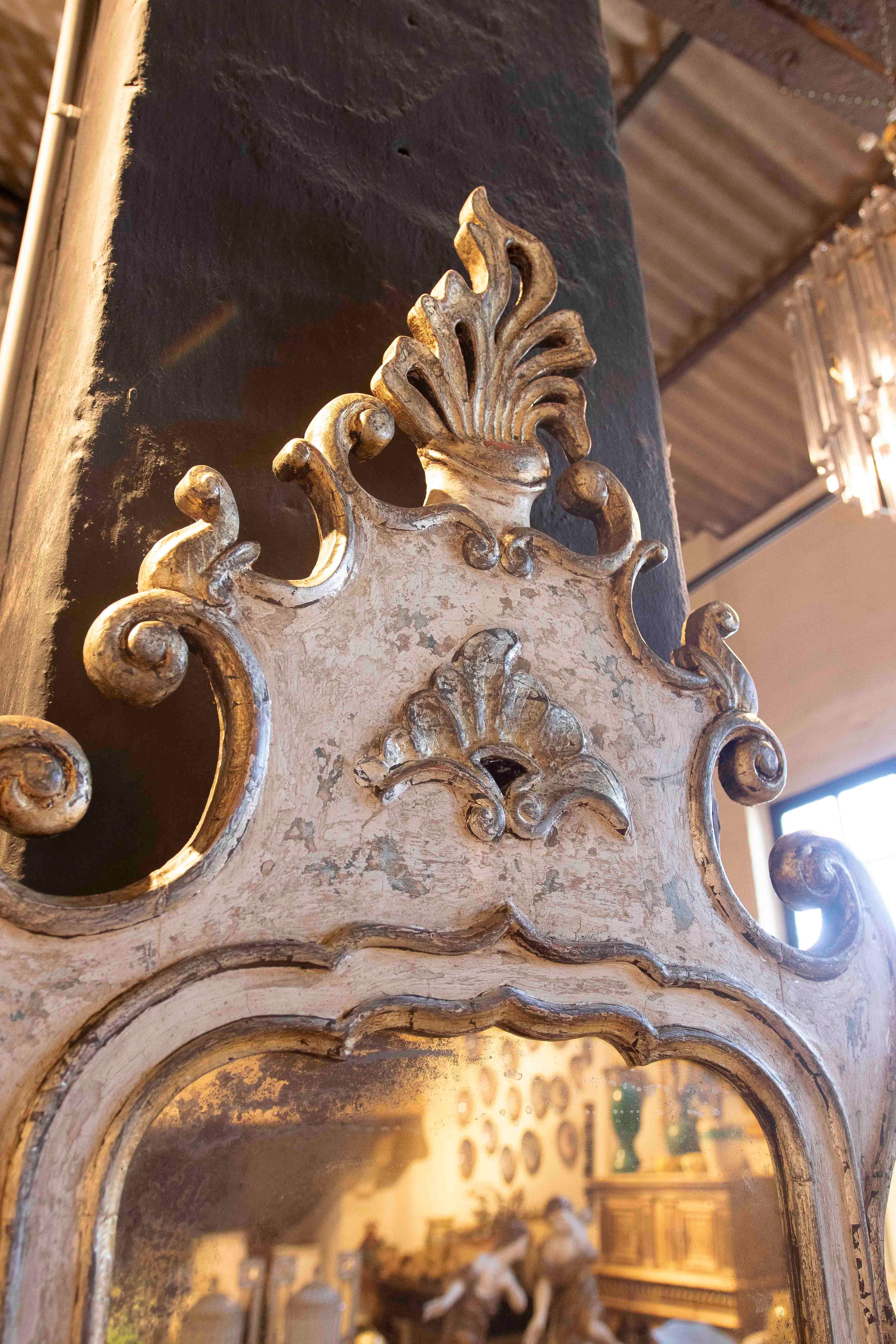 Hand-Carved 1970s Venetian-Style Mirror with Carved and Gilded Frame For Sale
