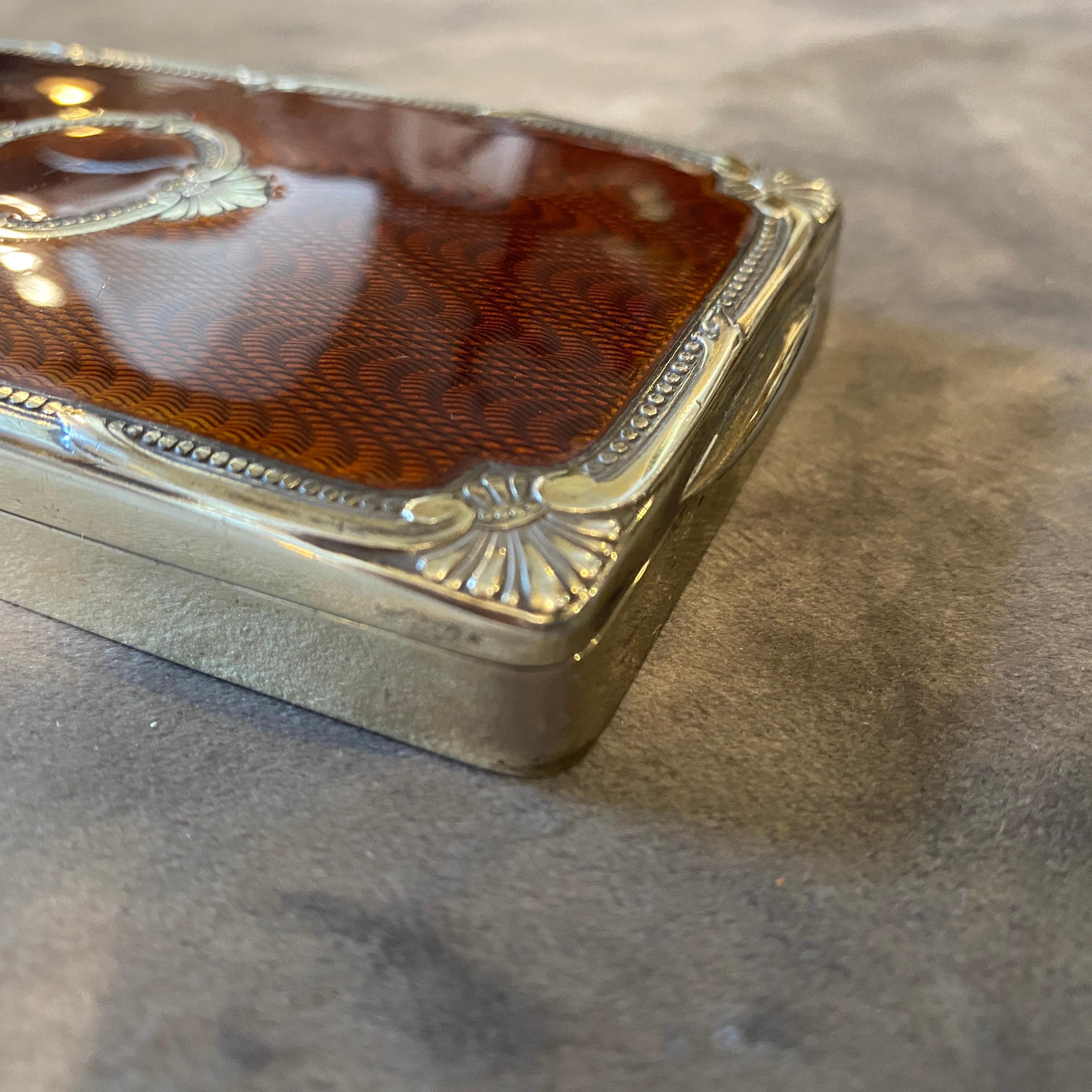 A superb quality brown enameled cigarette box made in Italy in the Seventies by Salimbeni, famous manufacturer. It's all marked vermeil solid silver.