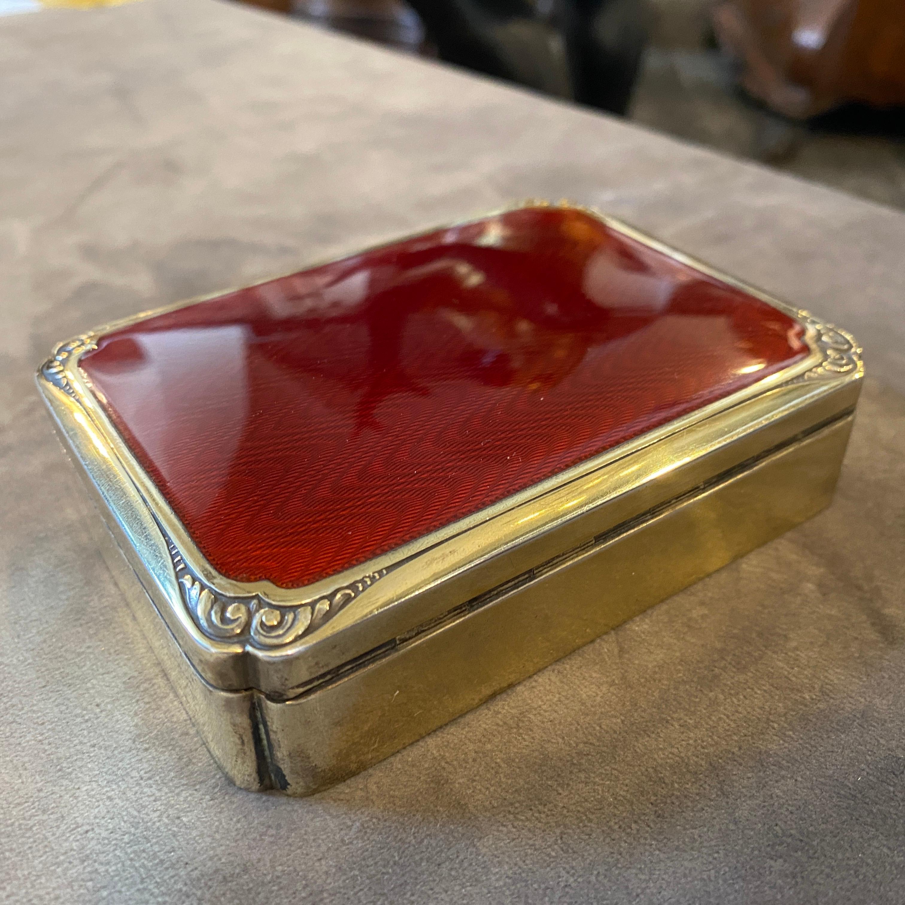 A superb quality red enameled cigarette box made in Italy in the Seventies by Salimbeni, famous manufacturer. It's all marked vermeil solid silver.