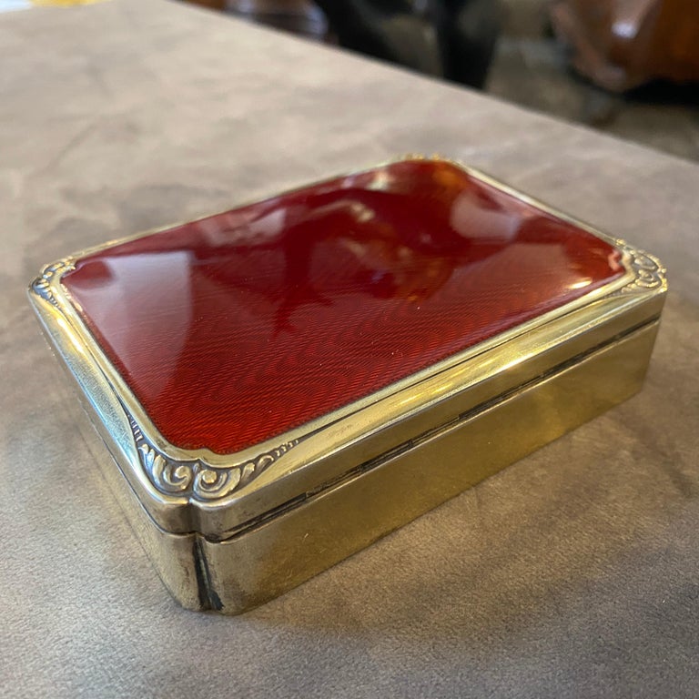 A superb quality red enameled cigarette box made in Italy in the Seventies by Salimbeni, famous manufacturer. It's all marked vermeil solid silver.