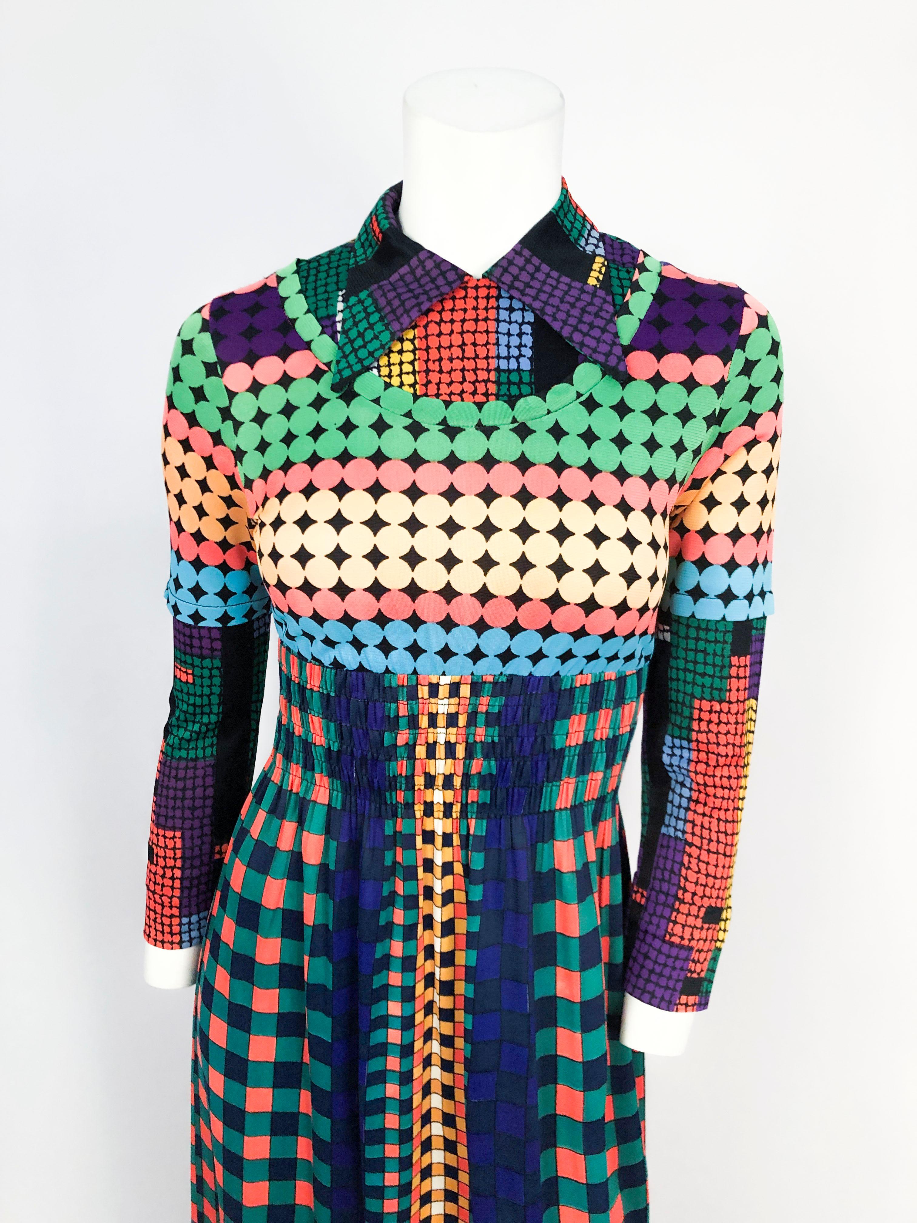 1970s Vibrant Geometric Printed Dress (in green, lime, violet, orange, etc.) featuring an oversized collar, smocked waist, overlaying detail on the arms and the neckline.