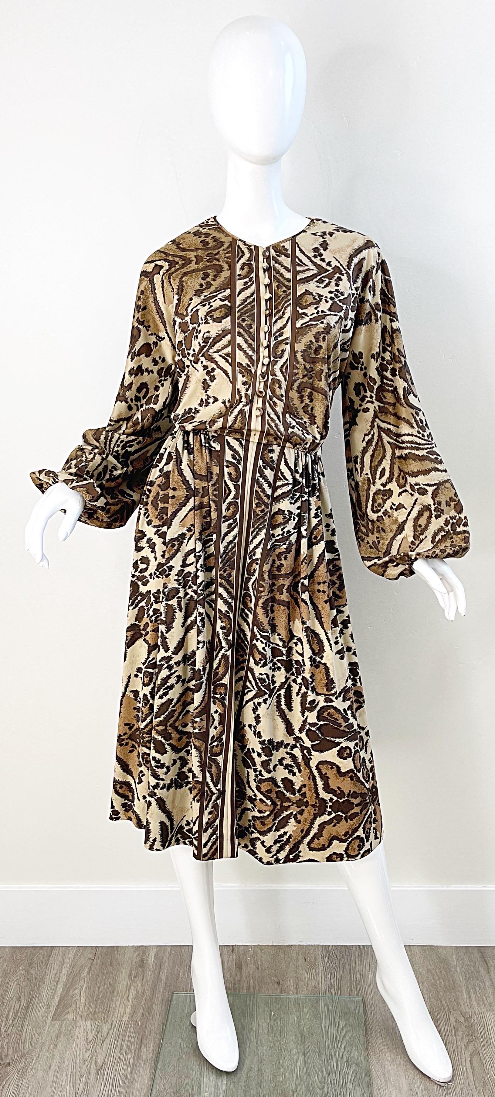 Chic 1970s VICTOR COSTA leopard animal print long bishop sleeve dress ! Fabric covered buttons up the front. Tailored bodice with a flattering and forgiving skirt. POCKETS at each side of the waist. Hidden zipper up the back with hook-and-eye