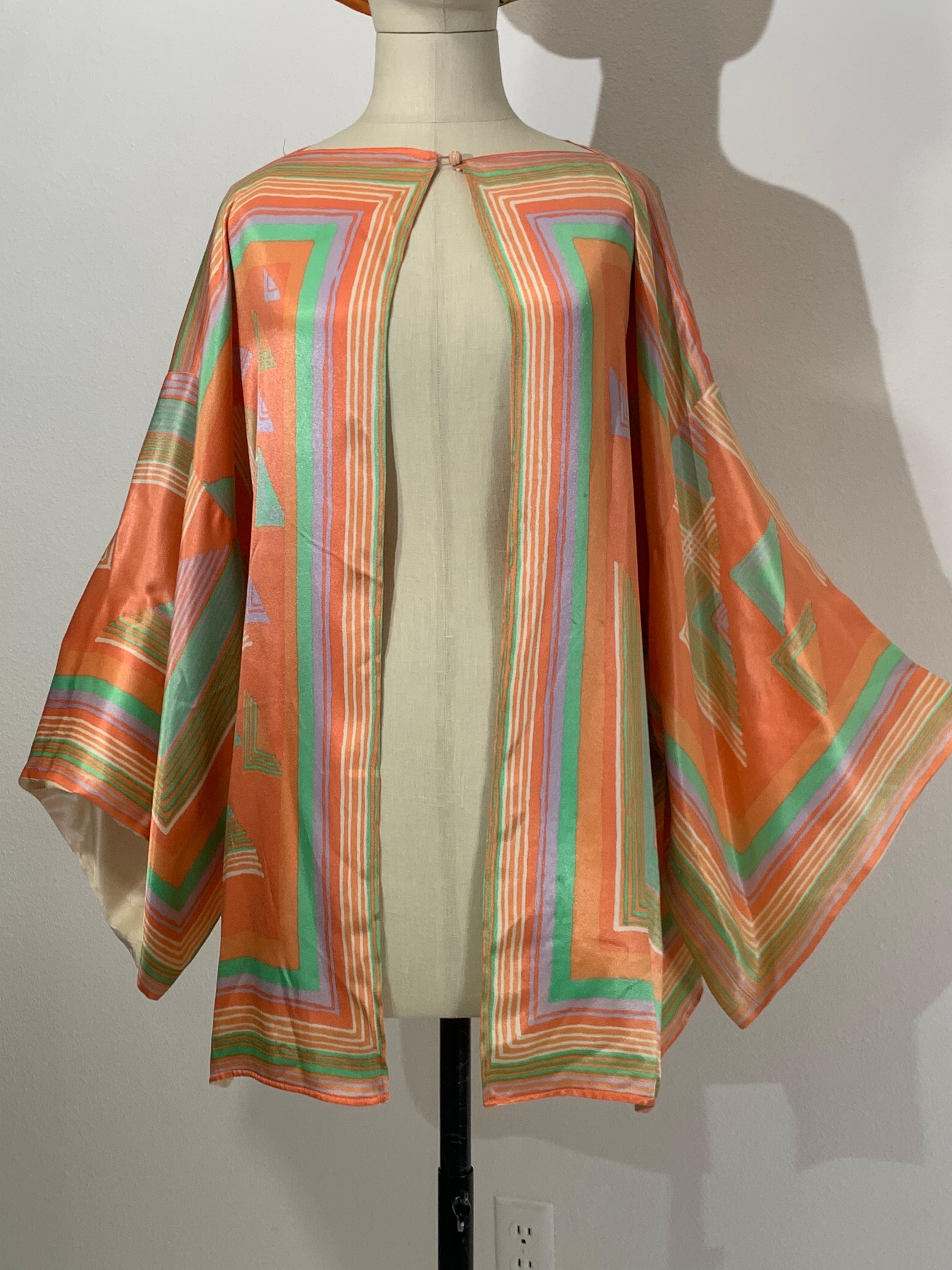 1970s Victor Costa Satin Deco-Revival Pastel Kimono Top Jacket:  A fabulously louche Art deco revival-style piece for languorous lounging!  In a most unusual pastel sorbet palette, this fabulous statement piece is so easy to wear, with trumpet