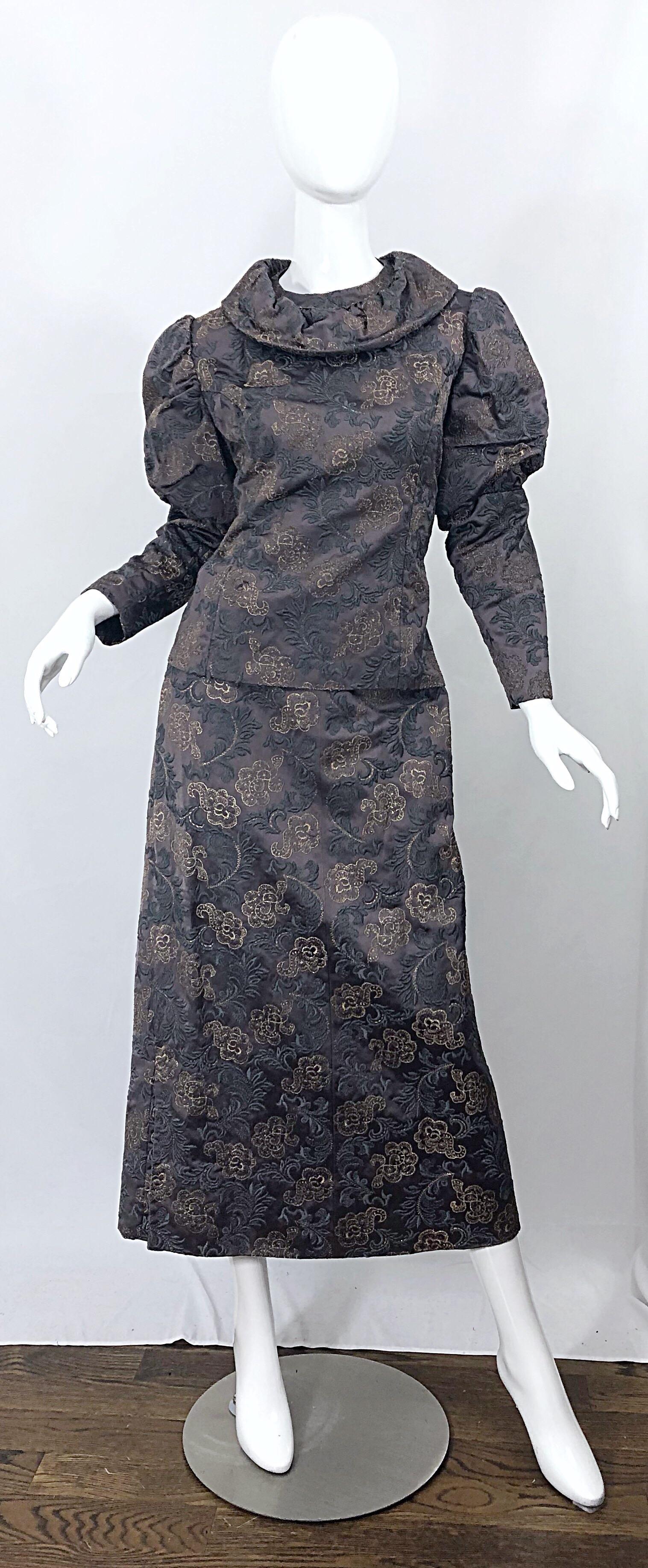 Beautiful 1970s does Victorian era silk brocade taupe and gray maxi skirt and blouse! Top features full metal zipper in the back with hook-and-eye closure. There is also a hidden metal zipper at the side. Chic puff sleeves with a disc collar. Skirt
