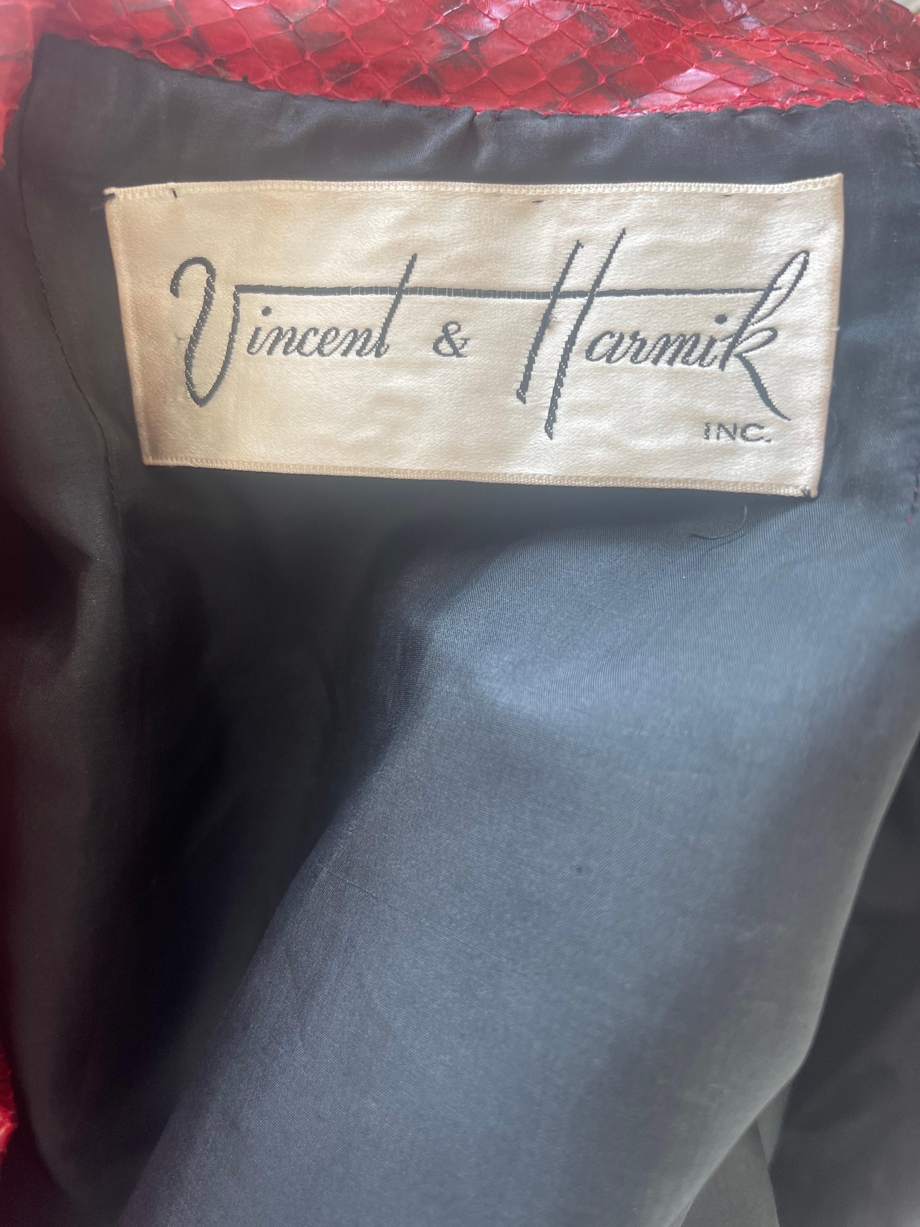 Rare museum worthy early 1970s Vincent and Harmik lipstick red snake skin / python bishop sleeve shirt / jacket ! Buttons up the front. Can be worn alone or layered. These retailed in the thousands in the the 70s. In great condition 
Made in