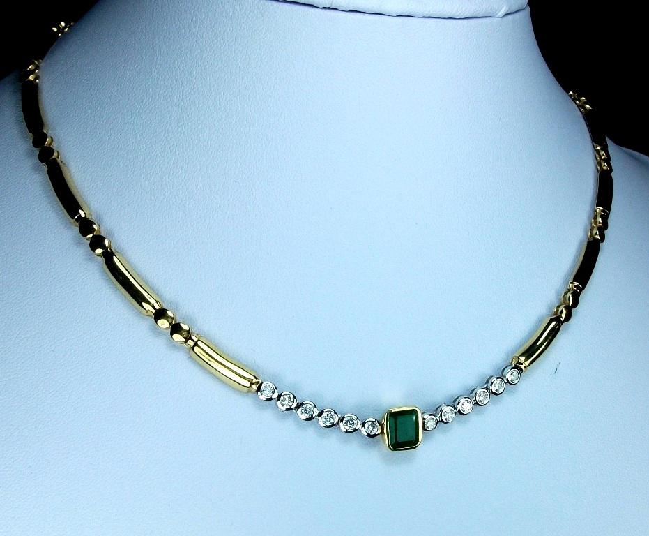 A fantastic neckace, circa 1960/1970 18k yellow gold and approximately 1.20 carat of G color diamonds necklace and emerald. The necklace is made of solid 18k gold and mounts a big emerald on its center of about 1.20 carats. The gold is finely