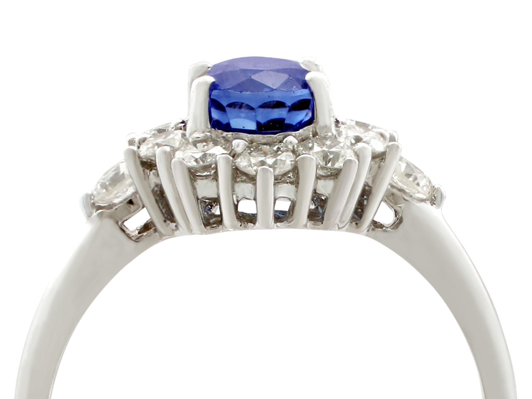 A stunning, fine and impressive vintage 1.21 carat natural blue sapphire and 0.84 carat diamond, 18 karat white gold cluster ring; part of our vintage jewelry and estate jewelry collections

This stunning sapphire cluster ring has been crafted in