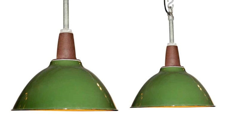 1970s green enamel over steel pendant light salvaged from a Birdsboro, PA power plant. Price includes restoration. Small quantity available at time of posting. Please inquire. Priced each. This can be seen at our 400 Gilligan St location in