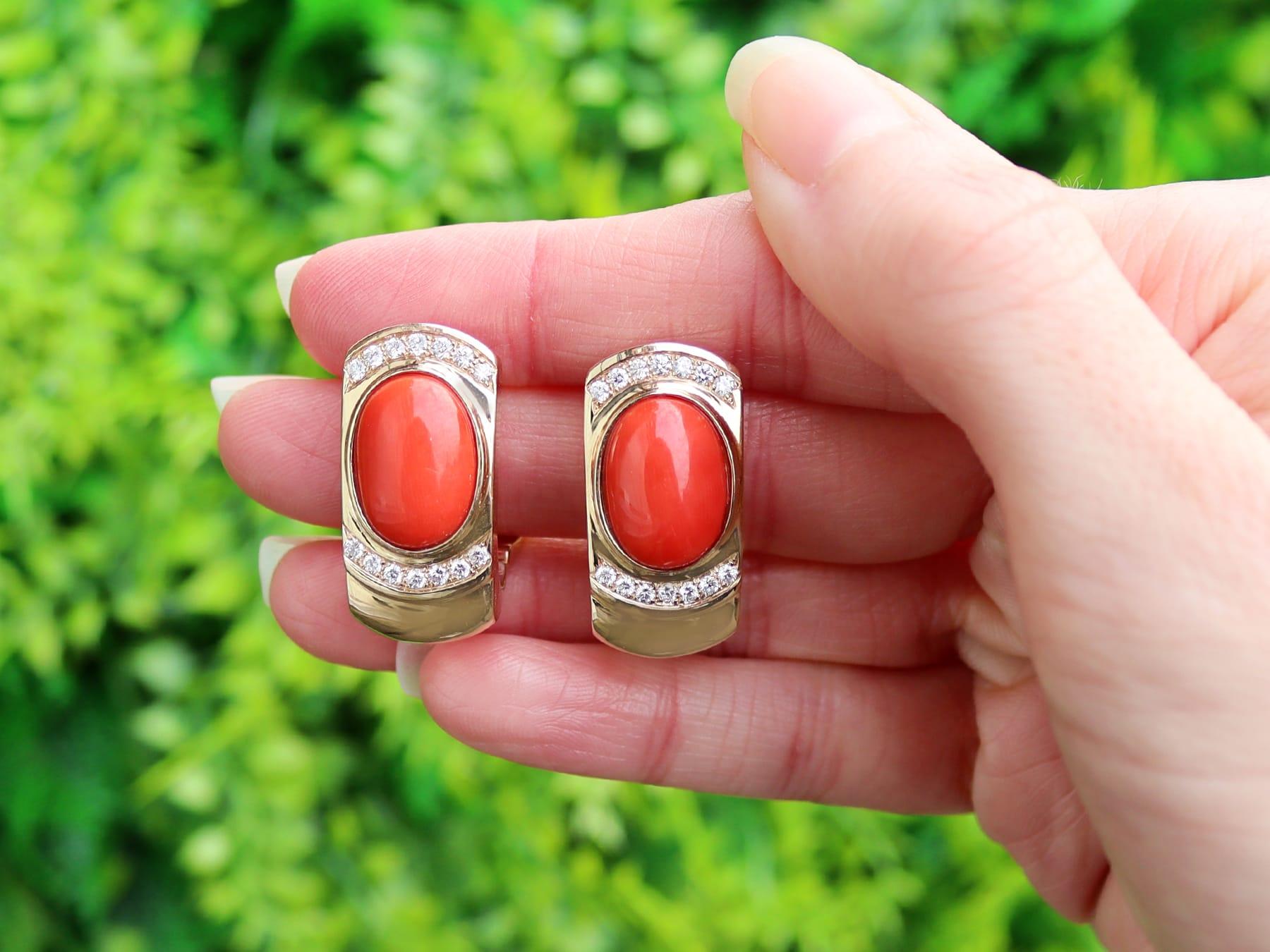 A stunning, fine and impressive pair of vintage 1970s 6.22 carat red coral and 0.70 carat diamond, 14 karat yellow gold earrings; part of our diverse vintage jewelry and estate jewelry collections.

These stunning, fine and impressive vintage